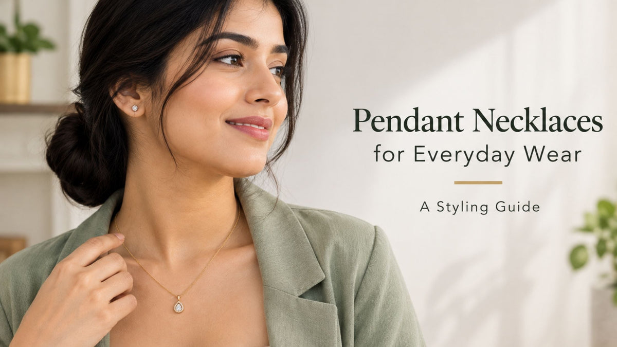 Pendant necklaces for everyday wear styled with a sage green blazer and cream top, showcasing a delicate gold pendant necklace.