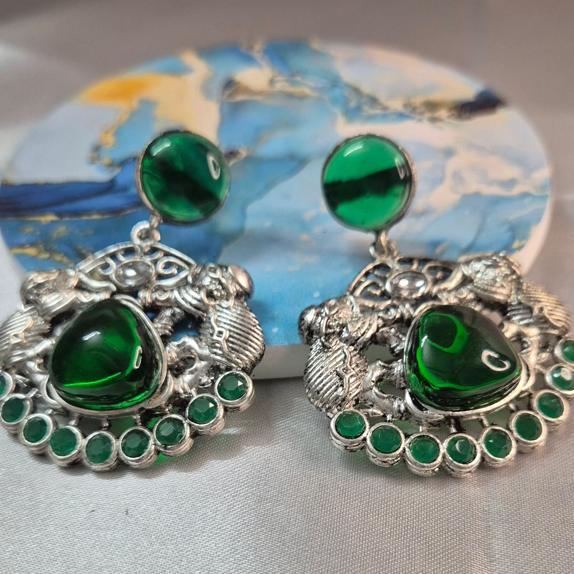 Oxidised dangler with Emerald green stone