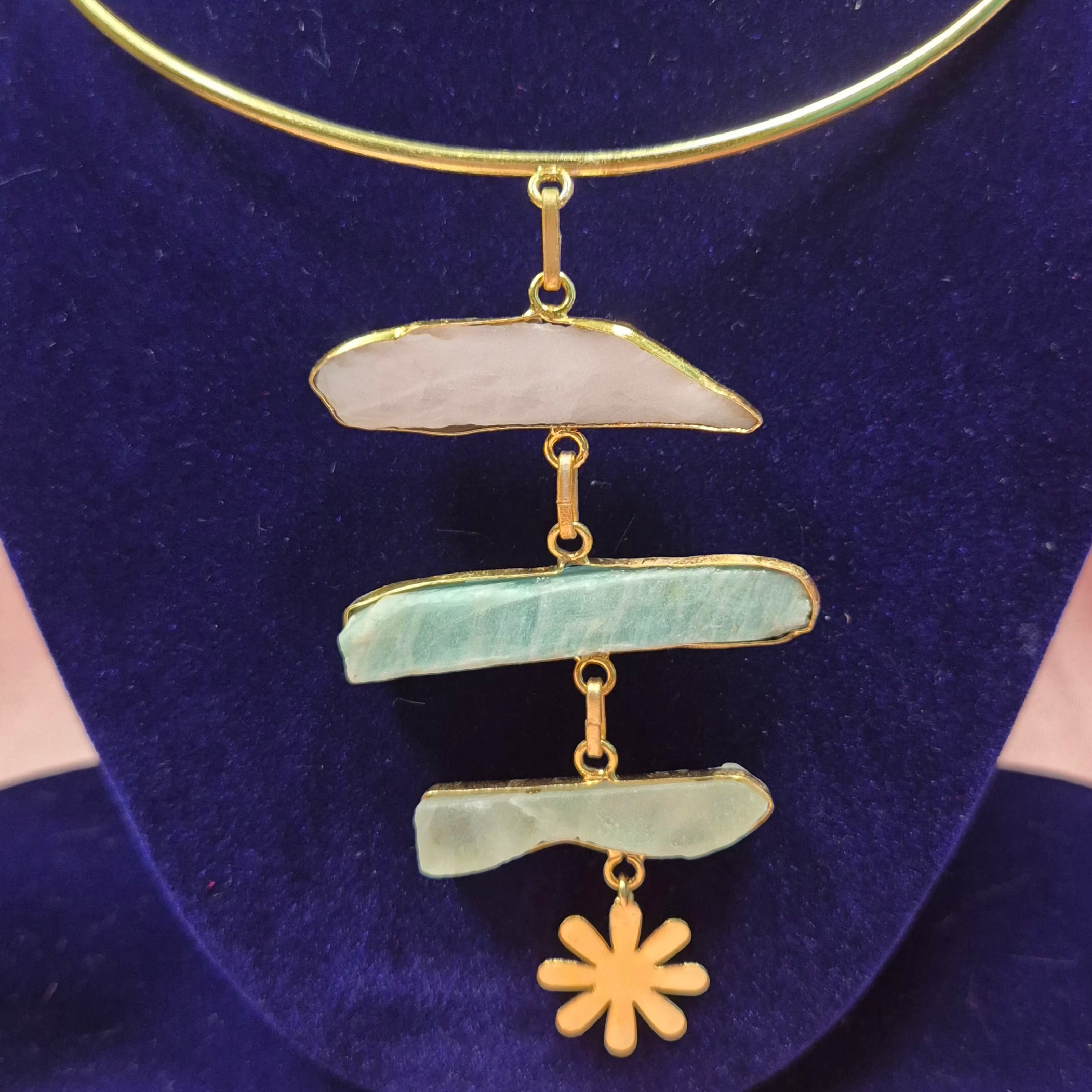 Stunning gold finish hasli set with natural stone finish and tribal pendant