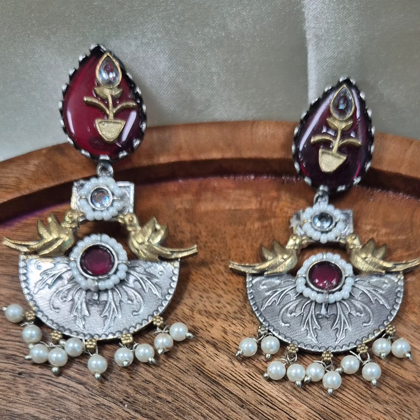 Dual tone oxidised chandbali earring with red meenakari work