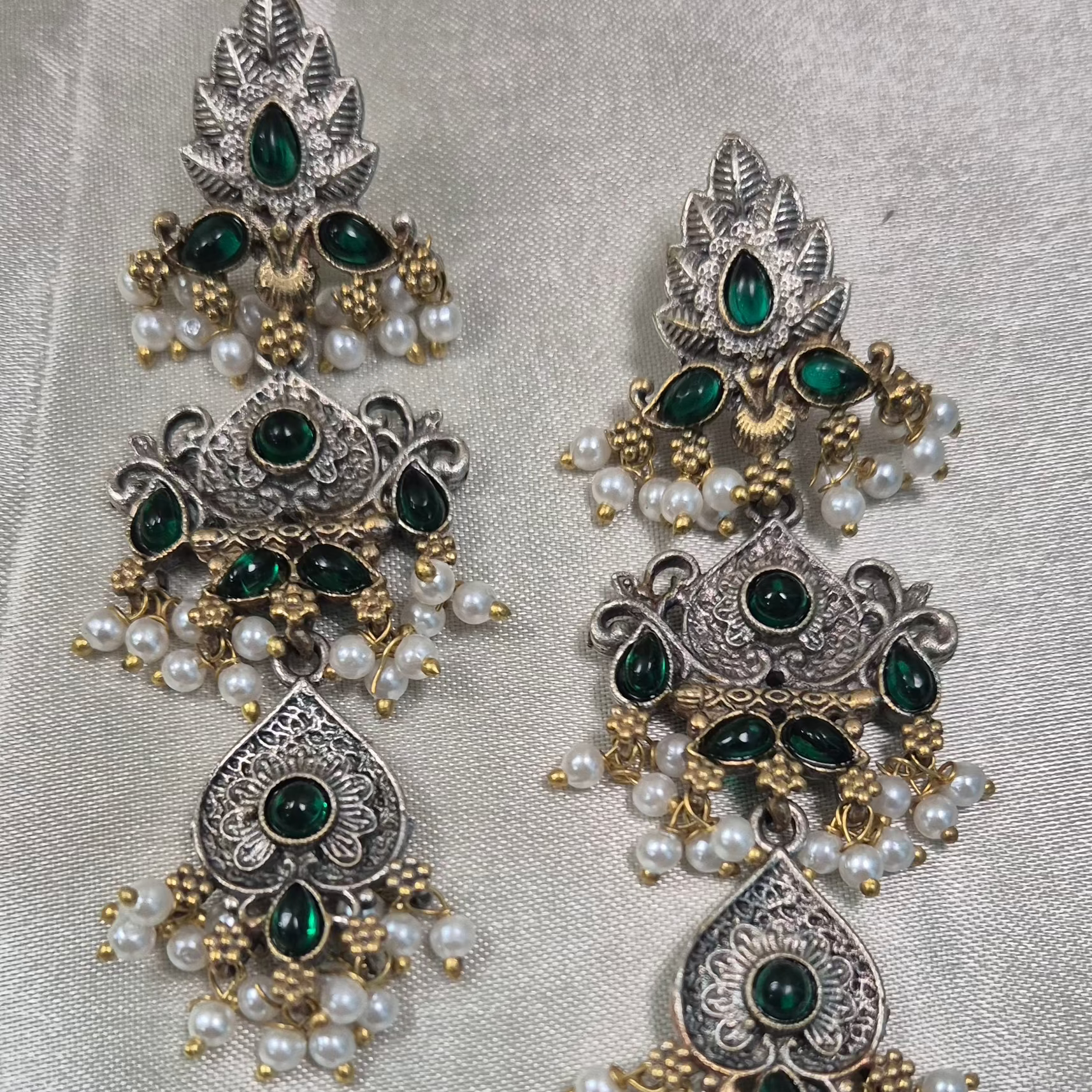 Oxidised danglers in green stones and pearl droppings