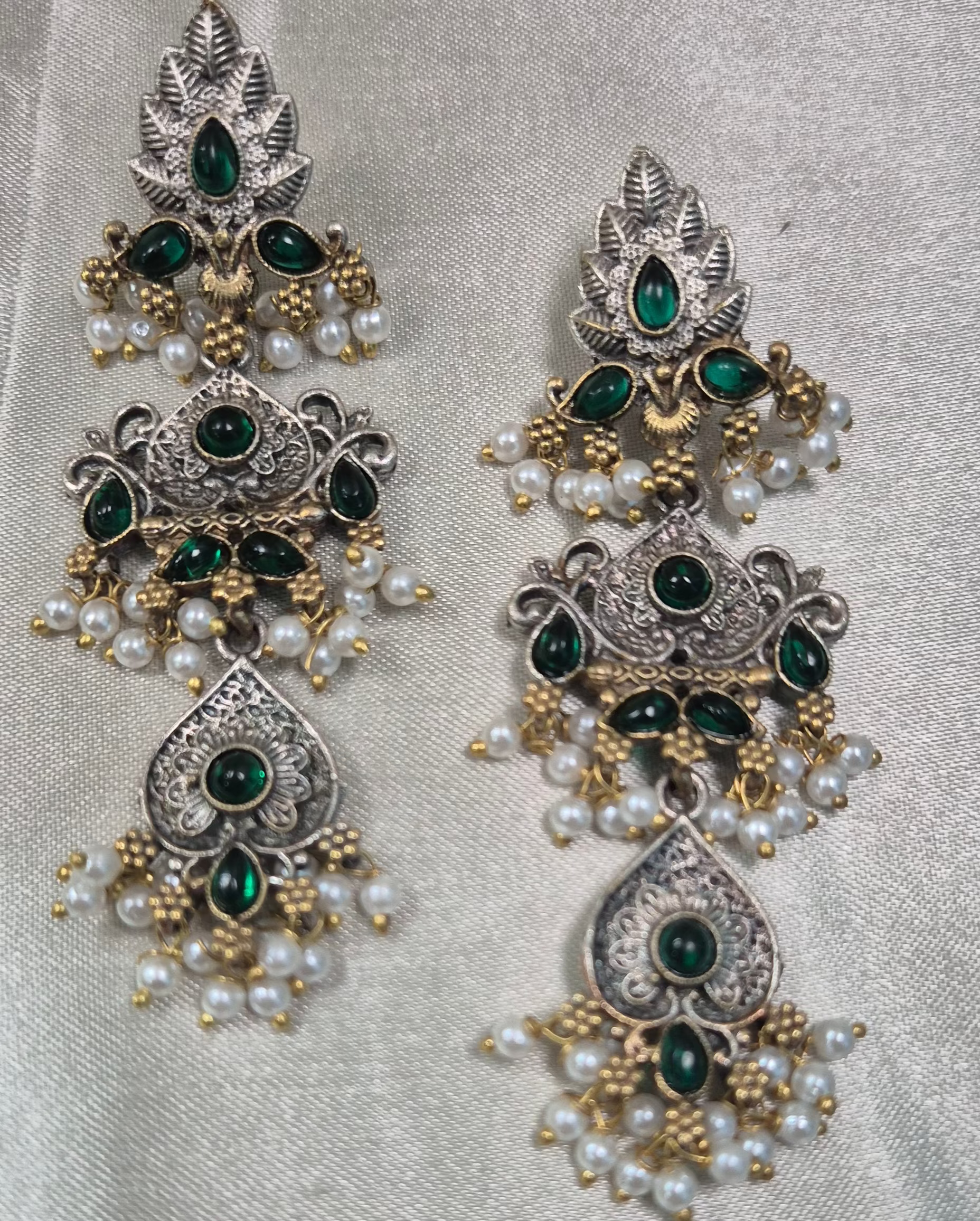 Oxidised danglers in green stones and pearl droppings