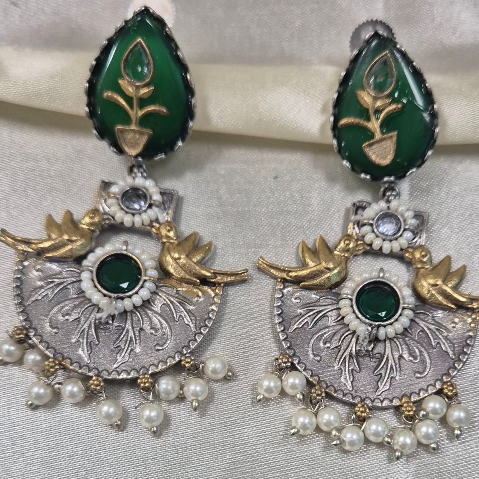 Dual tone chandbali danglers with green meenakari work