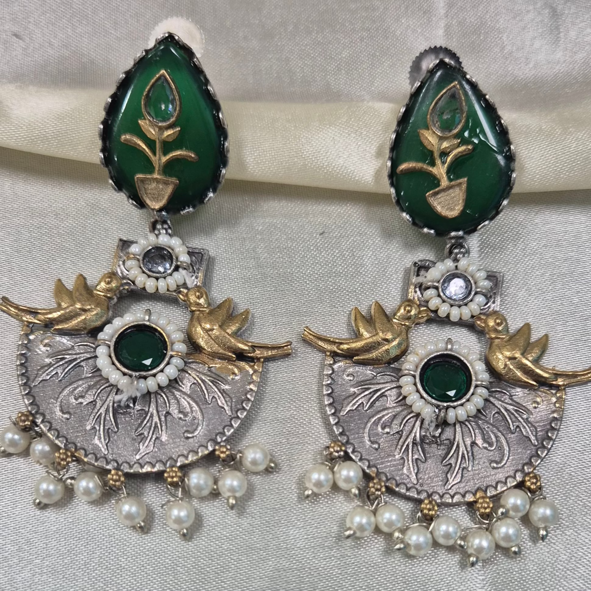 Dual tone chandbali danglers with green meenakari work