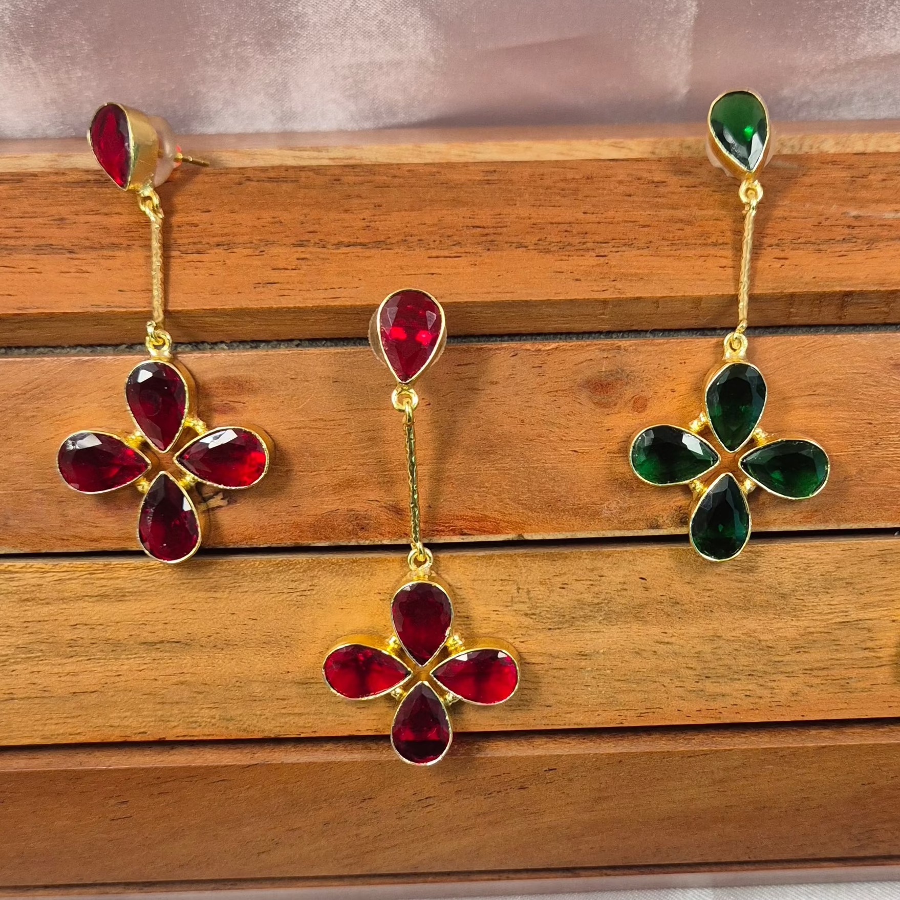 Golden flower with green/red stones dangler