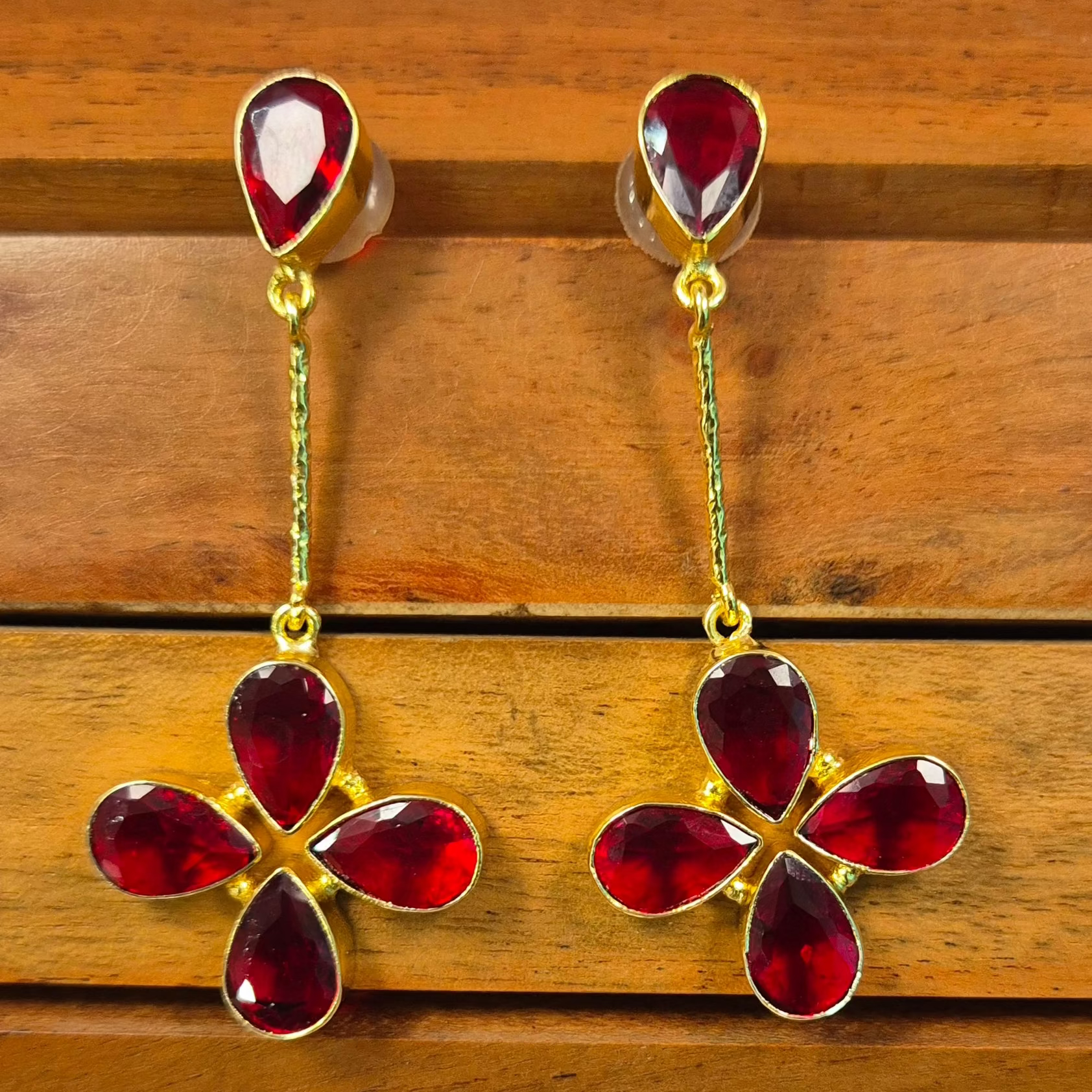 Golden flower with green/red stones dangler