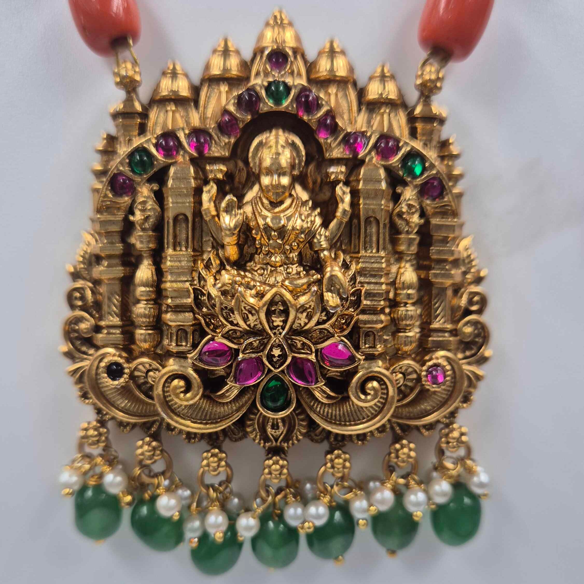 Antique Gold Finish Lakshmi Temple Pendant Necklace Set with Coral Beads & Jhumka Earrings