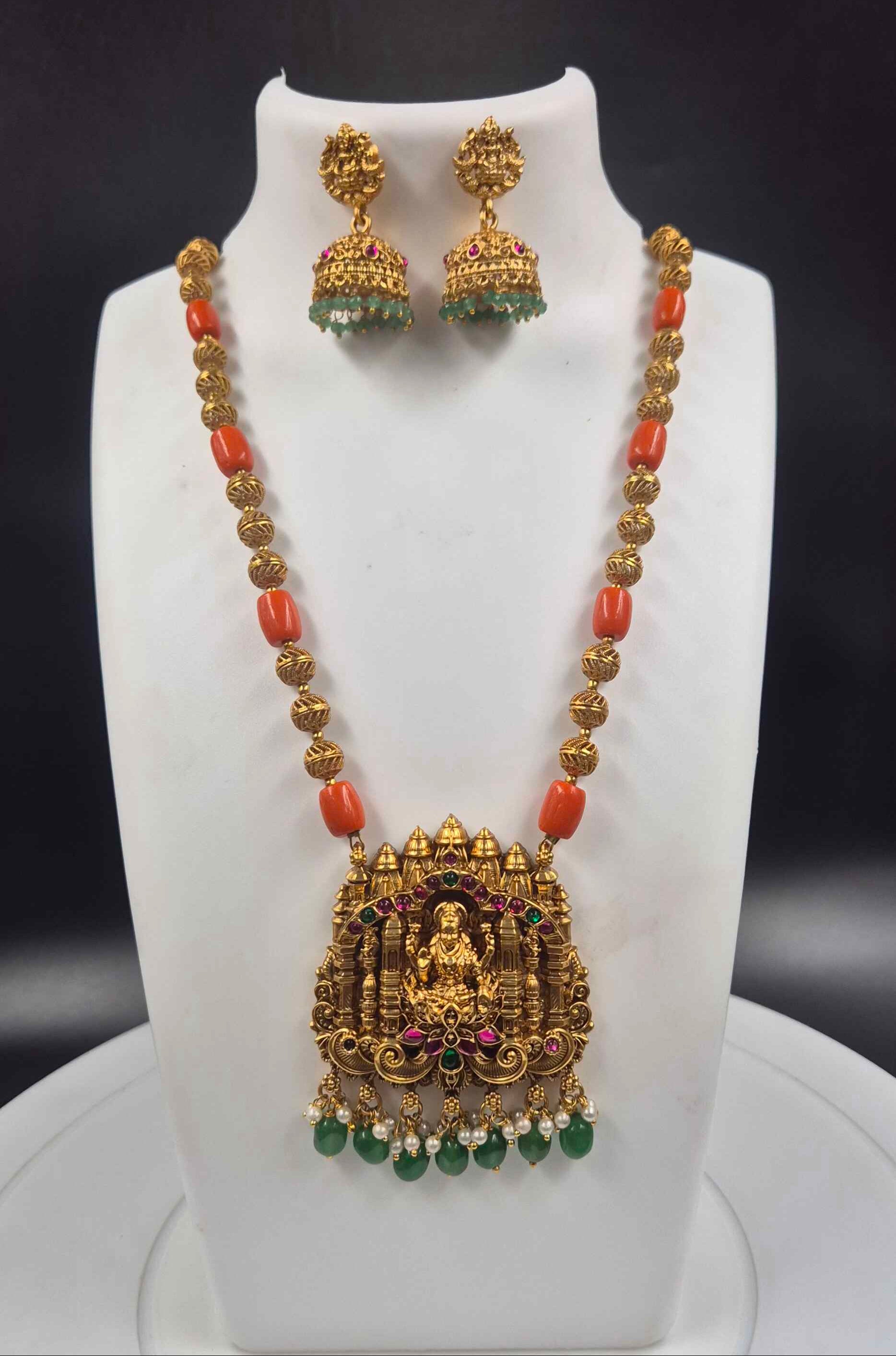 Antique Gold Finish Lakshmi Temple Pendant Necklace Set with Coral Beads & Jhumka Earrings