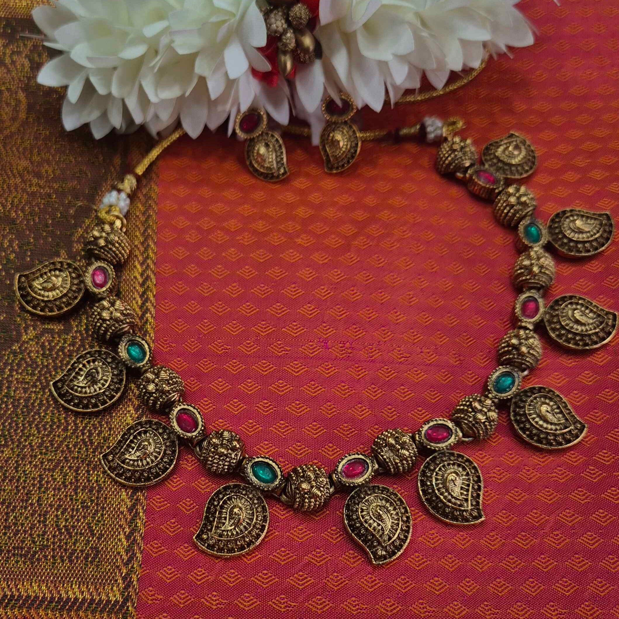 Antique Gold Finish mango Necklace Set with Ruby & Emerald Stone Accents | Traditional Ethnic Jewelry