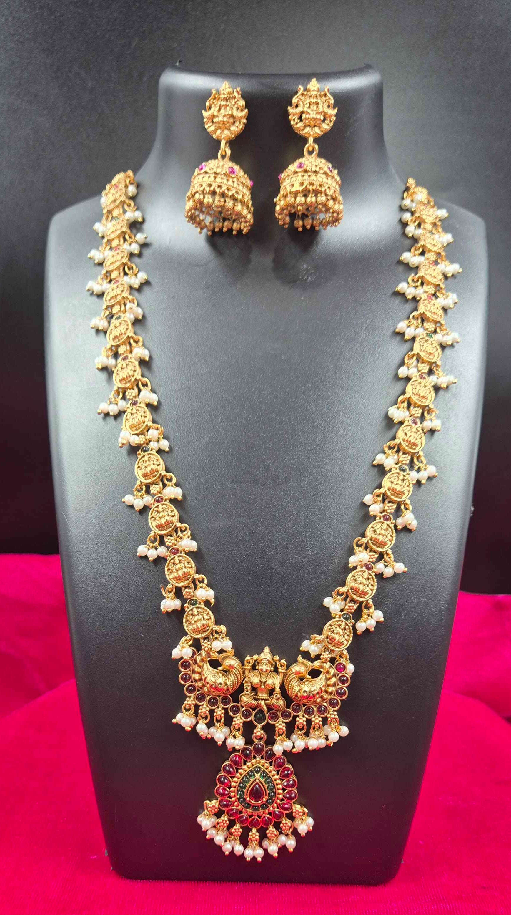 Antique Gold Finish Lakshmi Coin Haram Necklace Set with Ruby Stone Pendant & Pearl Drops