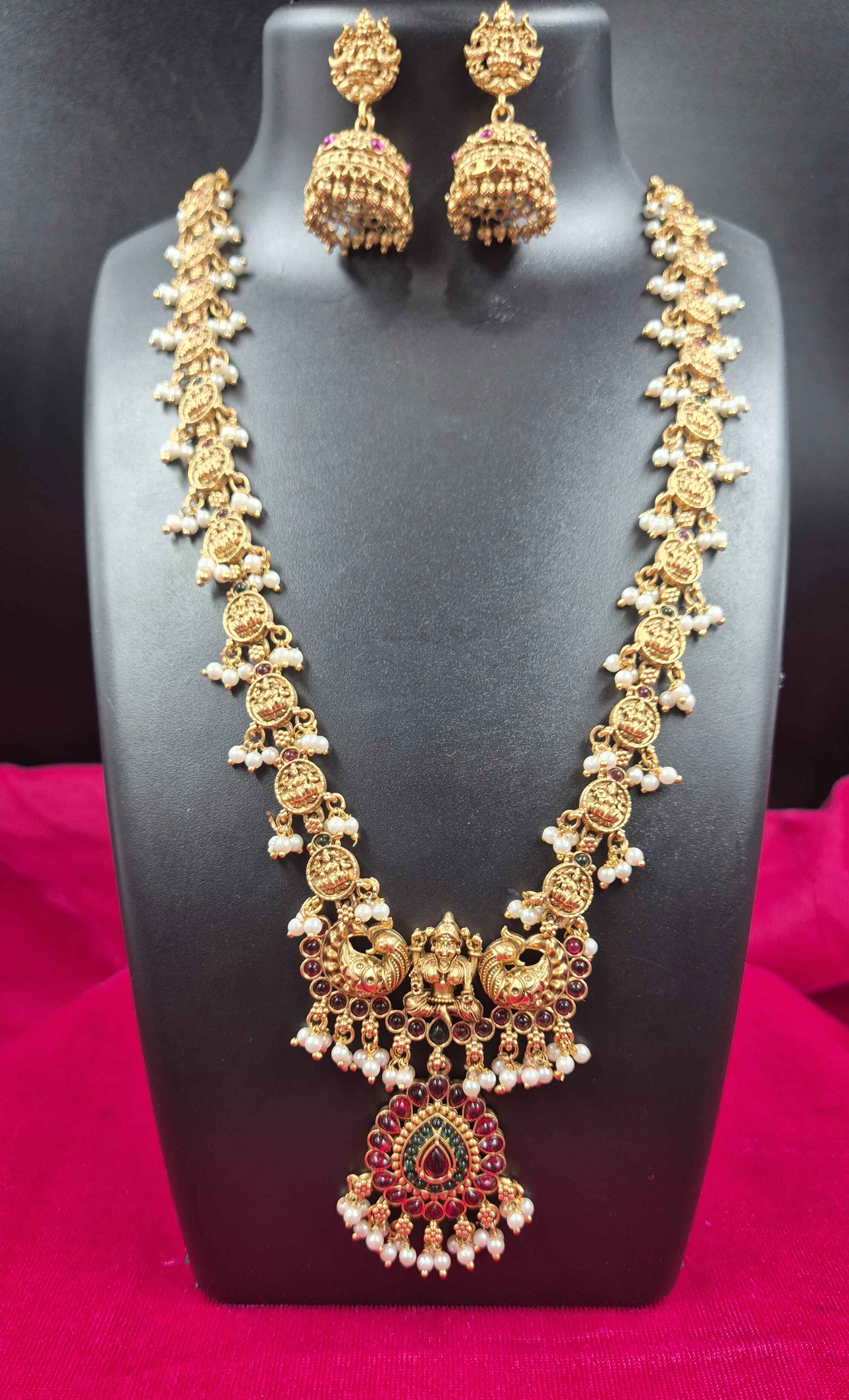 Antique Gold Finish Lakshmi Coin Haram Necklace Set with Ruby Stone Pendant & Pearl Drops