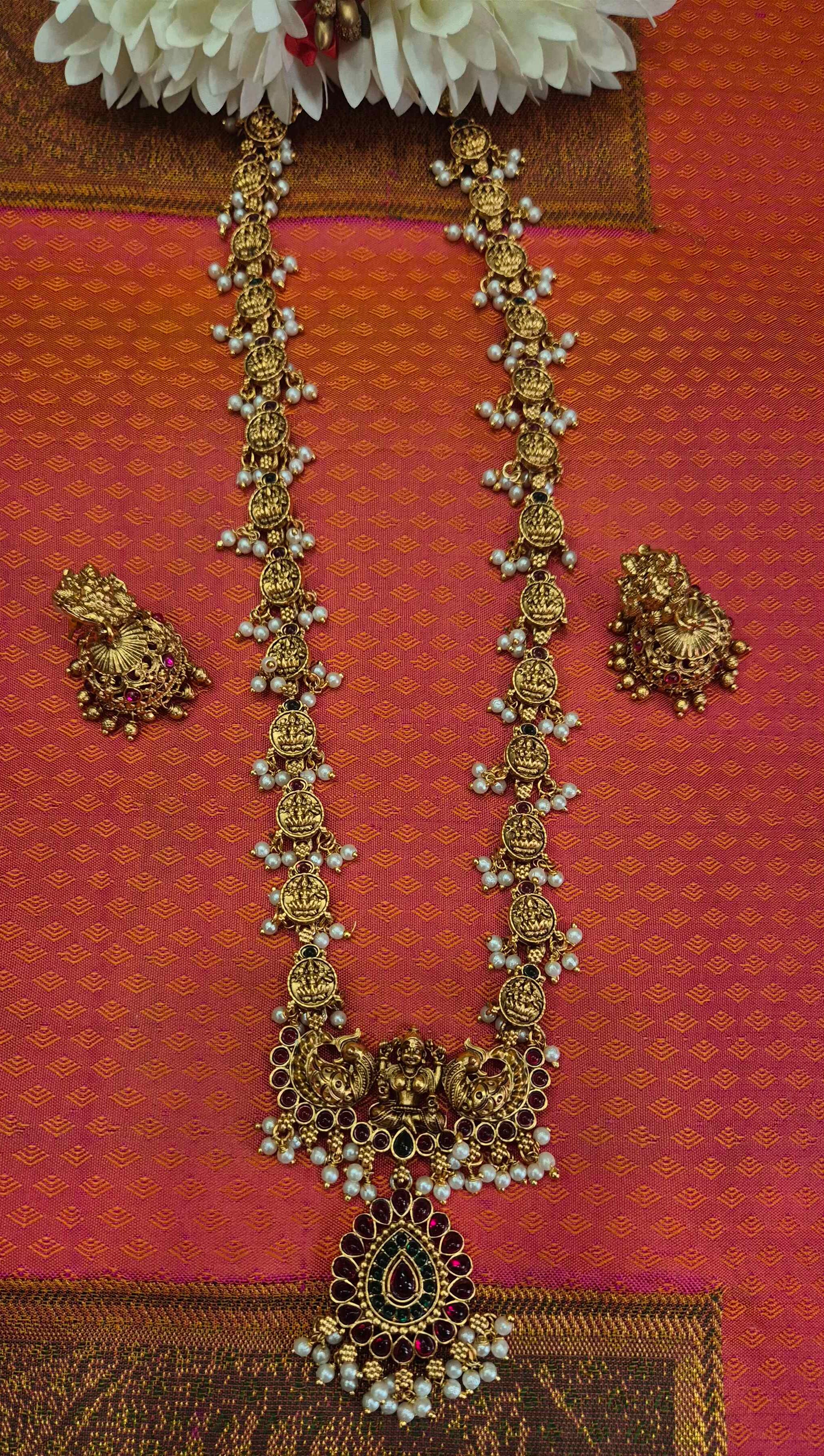 Antique Gold Finish Lakshmi Coin Haram Necklace Set with Ruby Stone Pendant & Pearl Drops