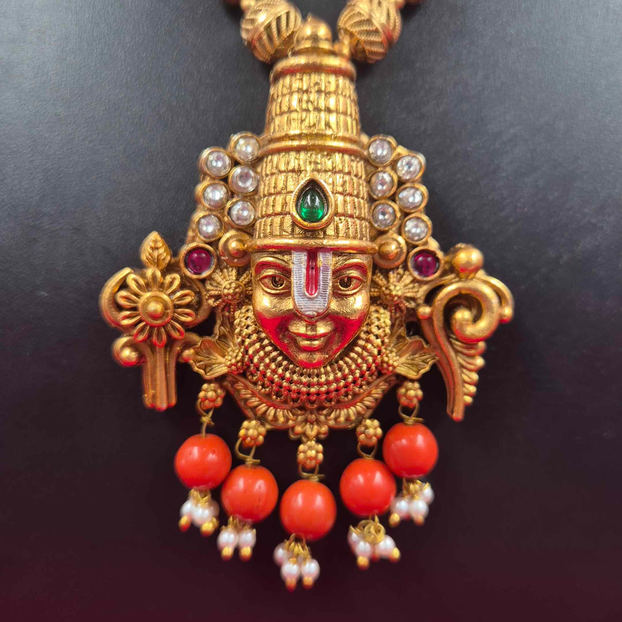 Antique Gold Finish Balaji/Srinivasa face Pendant haram Set with Coral orange Beads & Matching Earrings