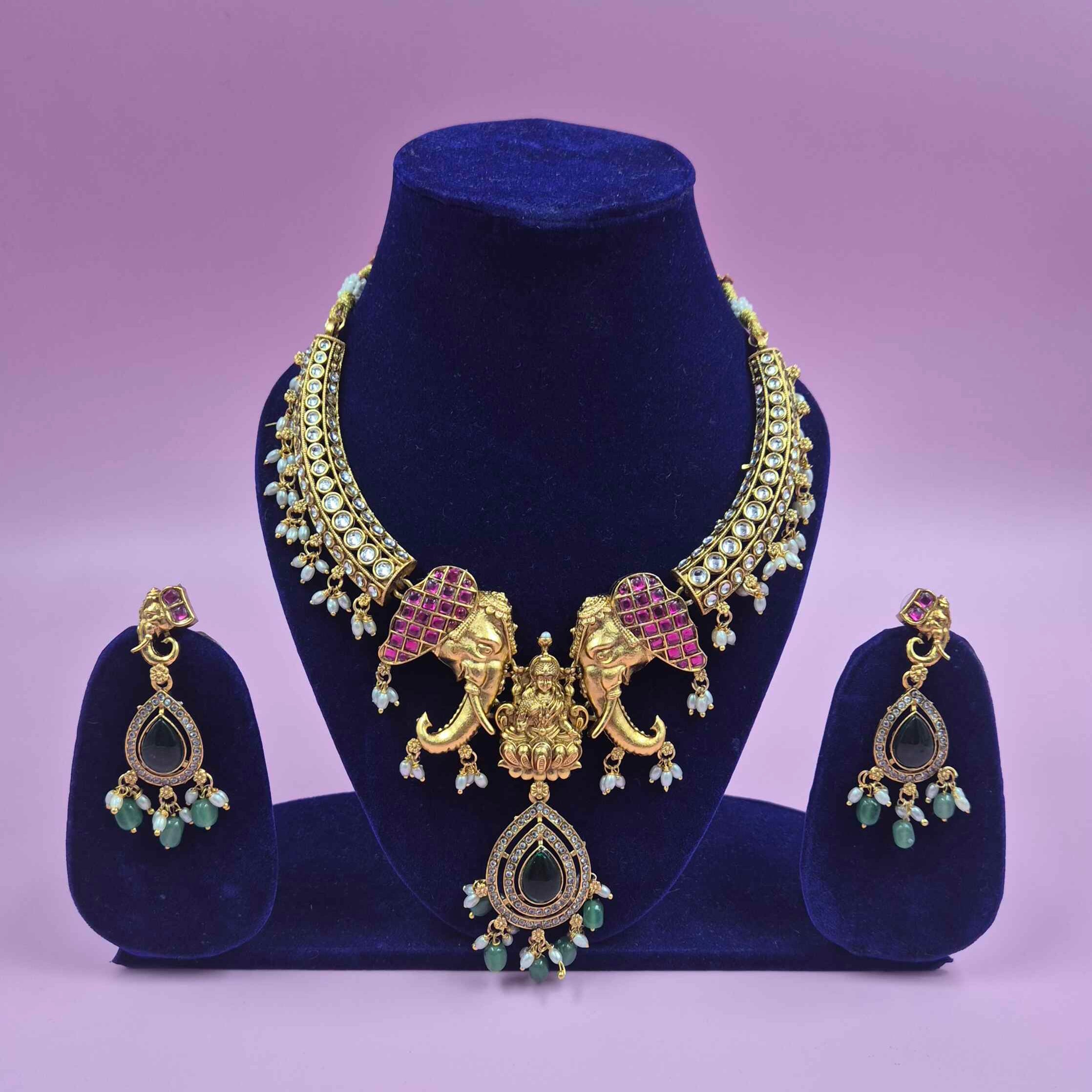 Antique Gold Finish Lakshmi Elephant Choker Necklace Set with Green Stone Drops | Temple Bridal Jewelry