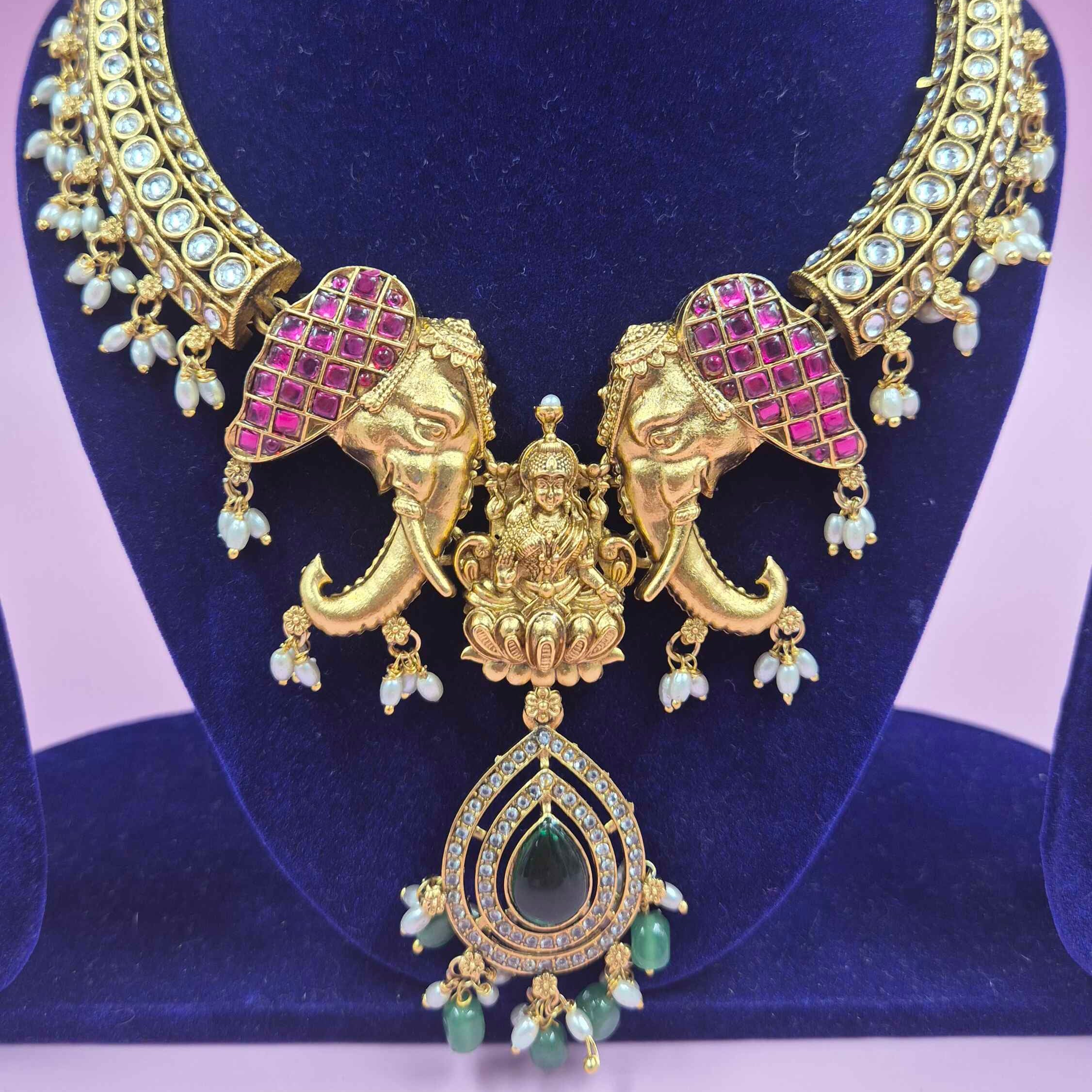 Antique Gold Finish Lakshmi Elephant Choker Necklace Set with Green Stone Drops | Temple Bridal Jewelry