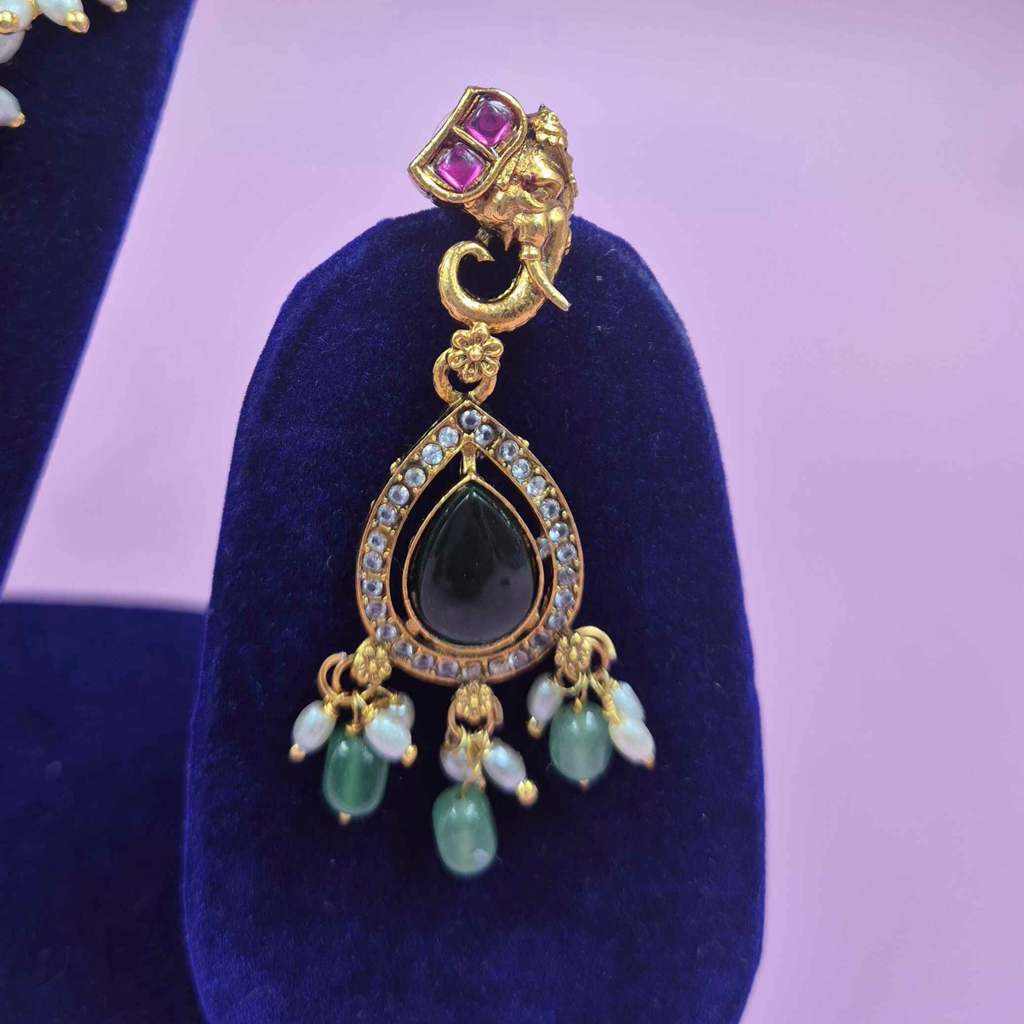 Antique Gold Finish Lakshmi Elephant Choker Necklace Set with Green Stone Drops | Temple Bridal Jewelry