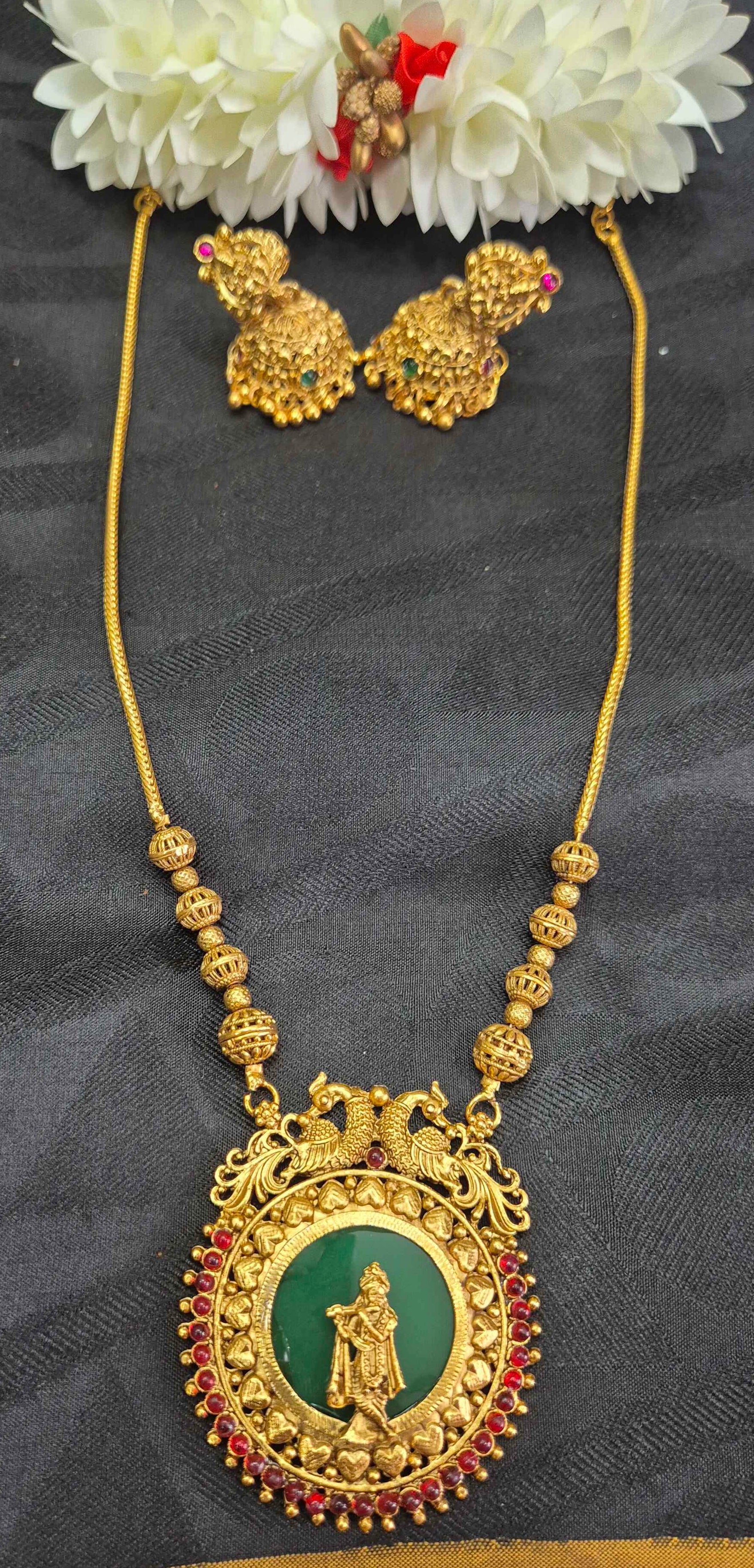 Antique Gold Finish Palaikka Krishna Pendant Necklace Set with Green Enamel & Ruby Stone Accents