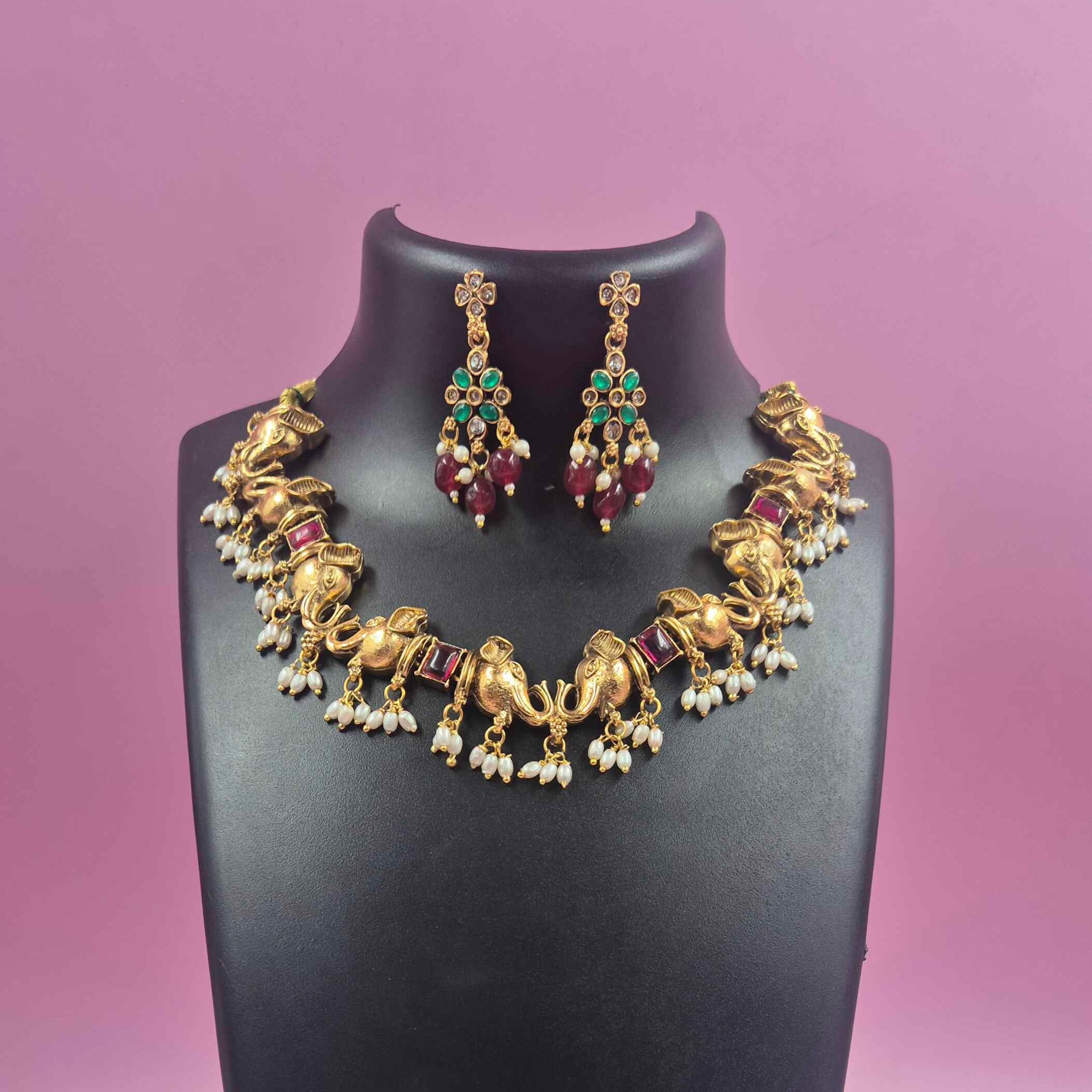 Gold Finish elephant Choker Necklace Set with Ruby Beads, Emerald Stones & Pearl Drops