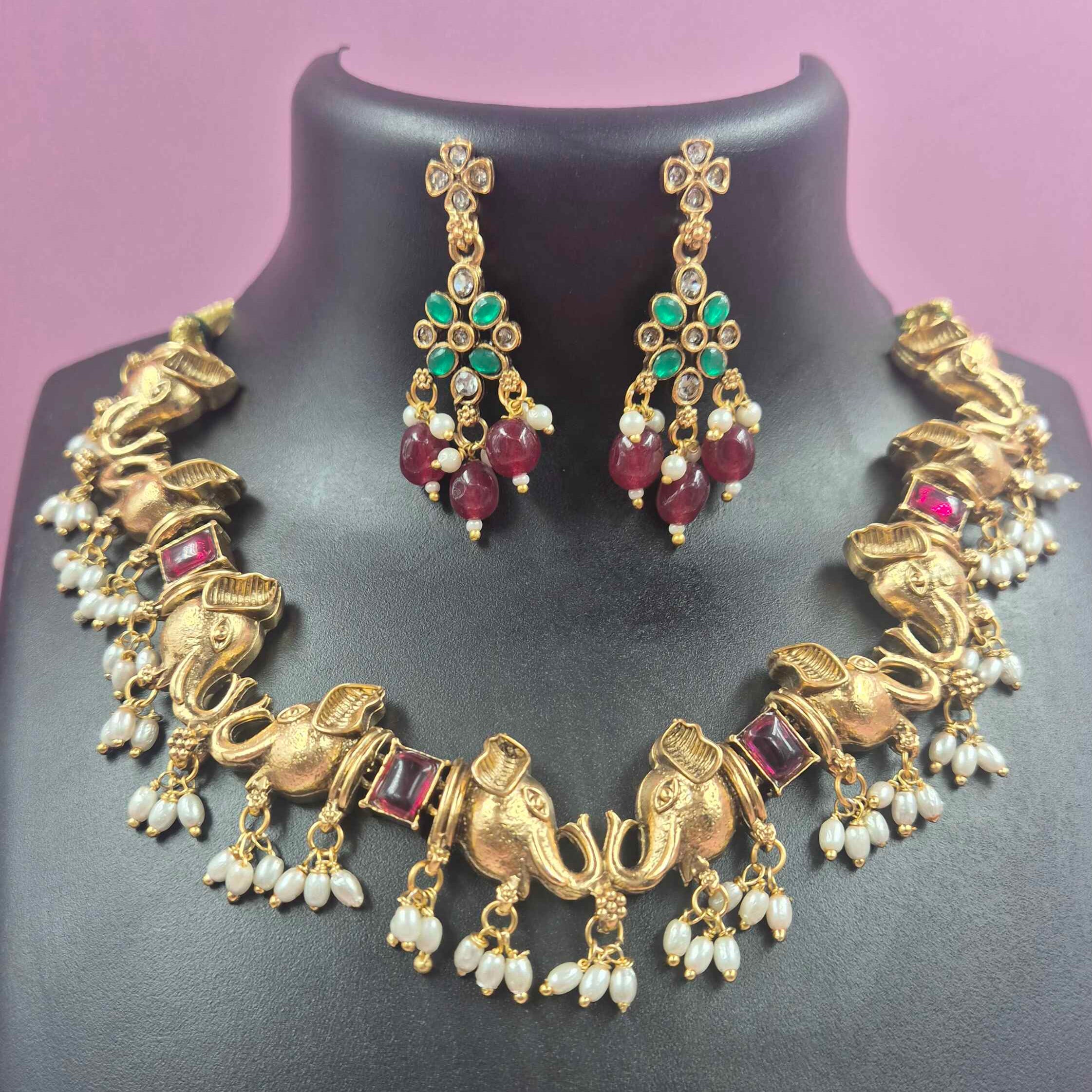 Gold Finish elephant Choker Necklace Set with Ruby Beads, Emerald Stones & Pearl Drops