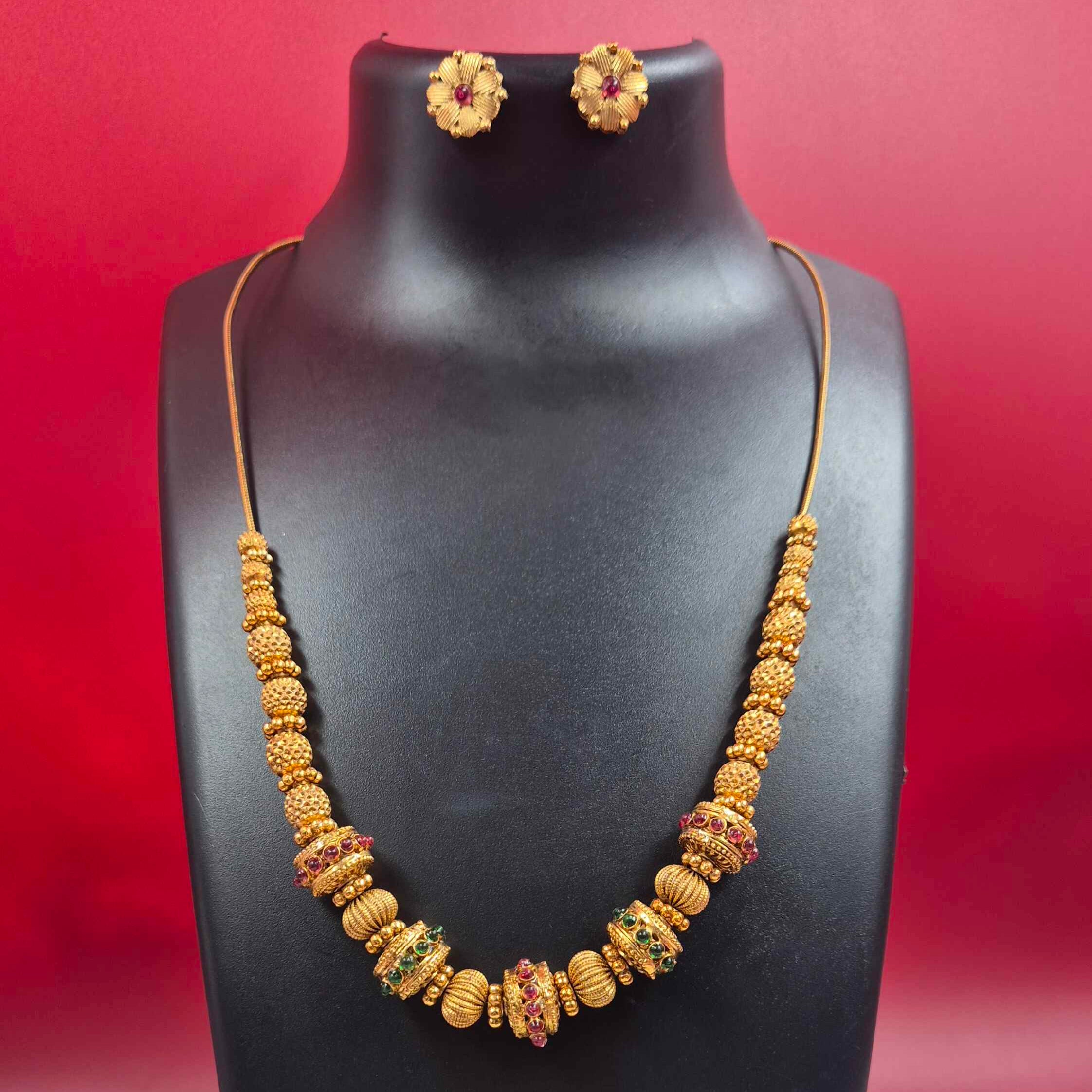 Gold Designer ball Necklace Set with Ruby & Emerald Stone Accents