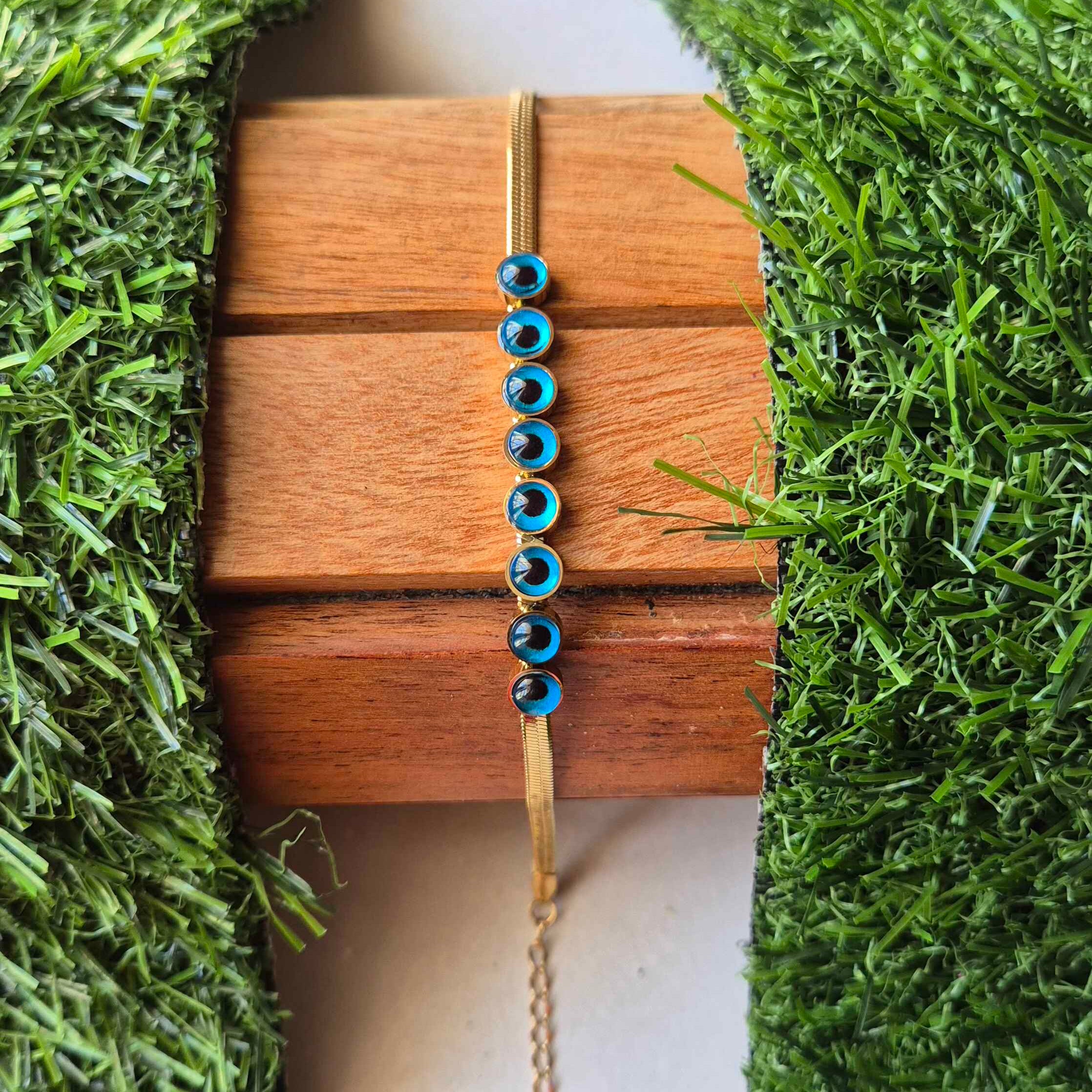 Gold-Tone Evil Eye Bracelet with Blue Protective Charm Accents