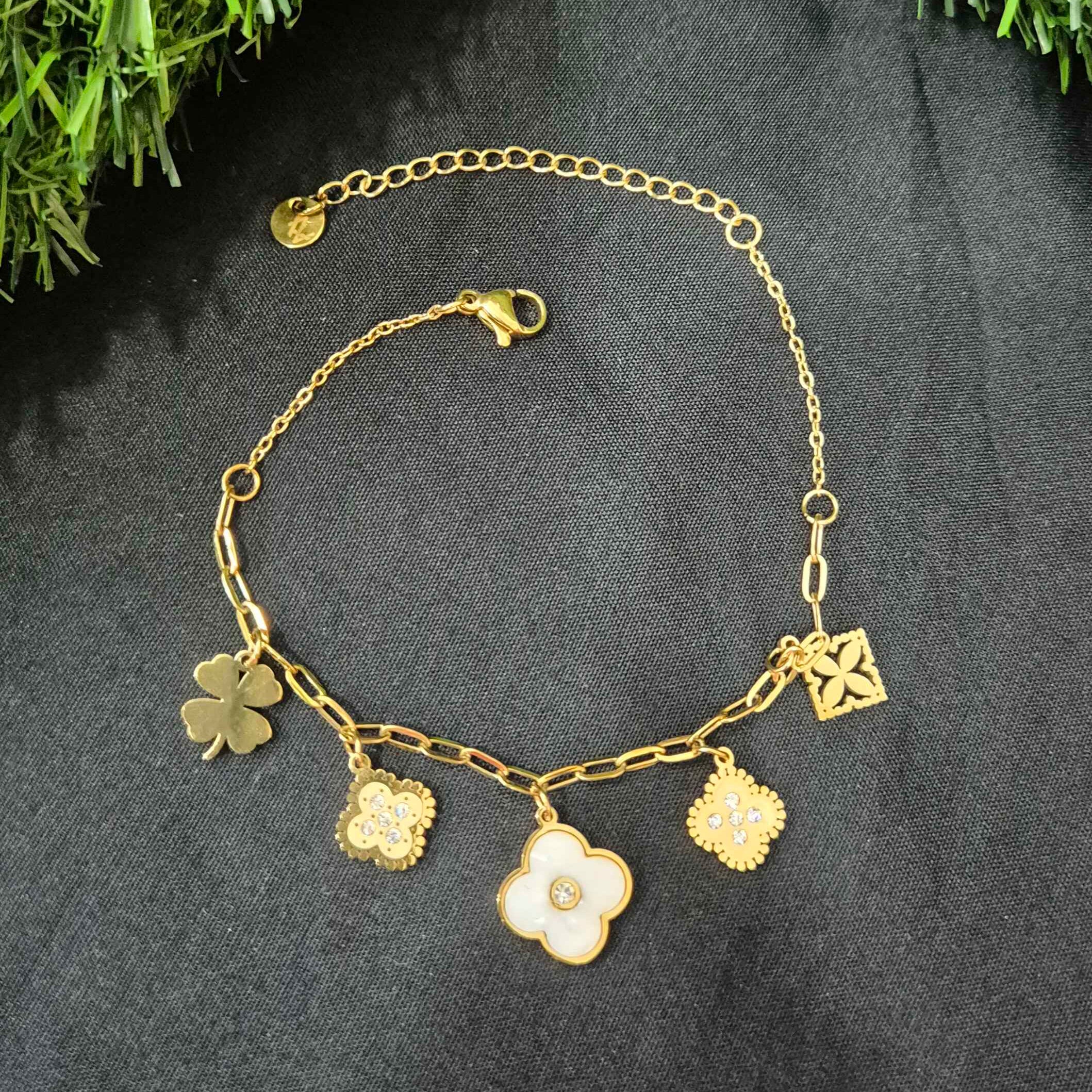 Gold-Tone Clover Charm Bracelet with White Floral Pendant