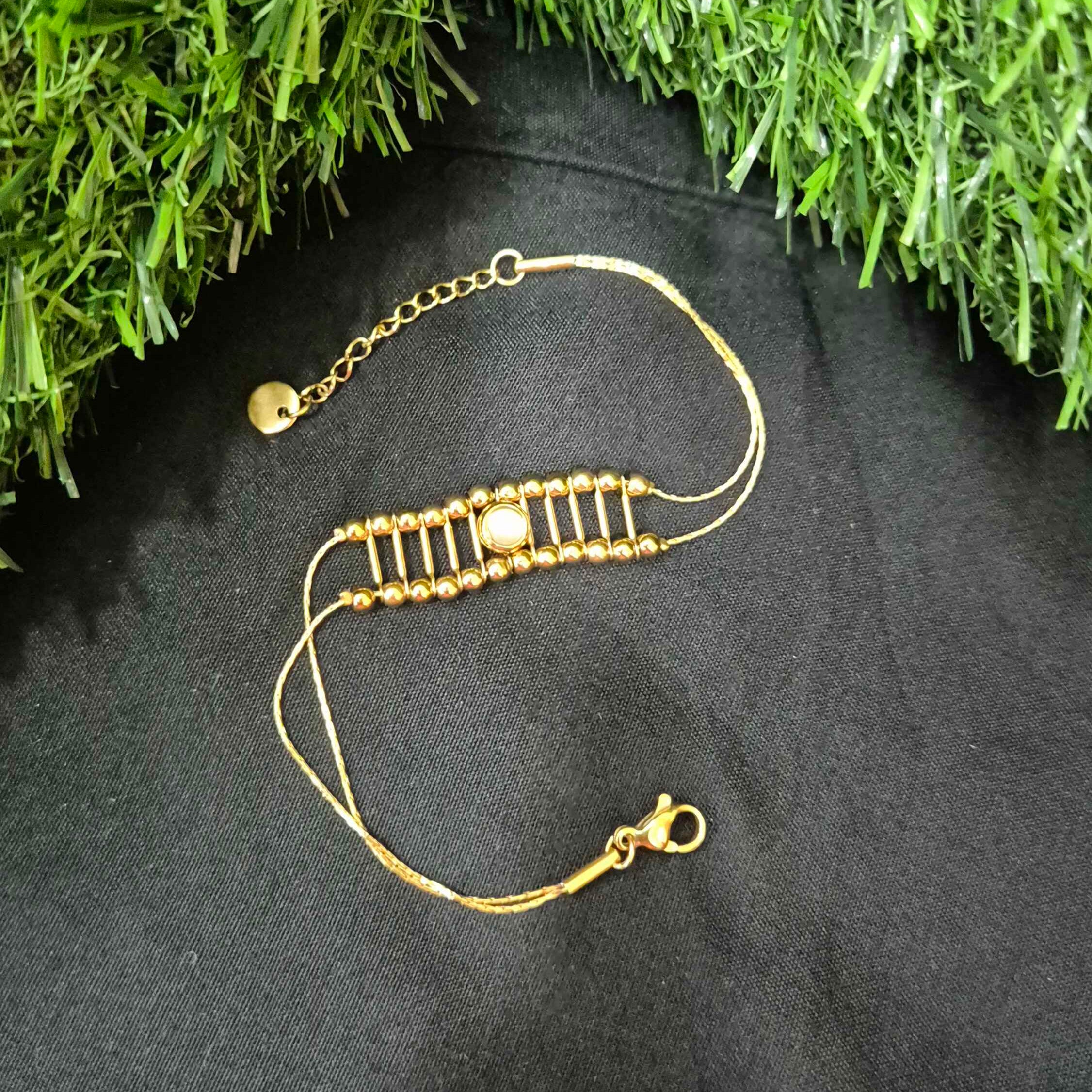 Gold-Tone Beaded Ladder design Bracelet with Round Center Accent