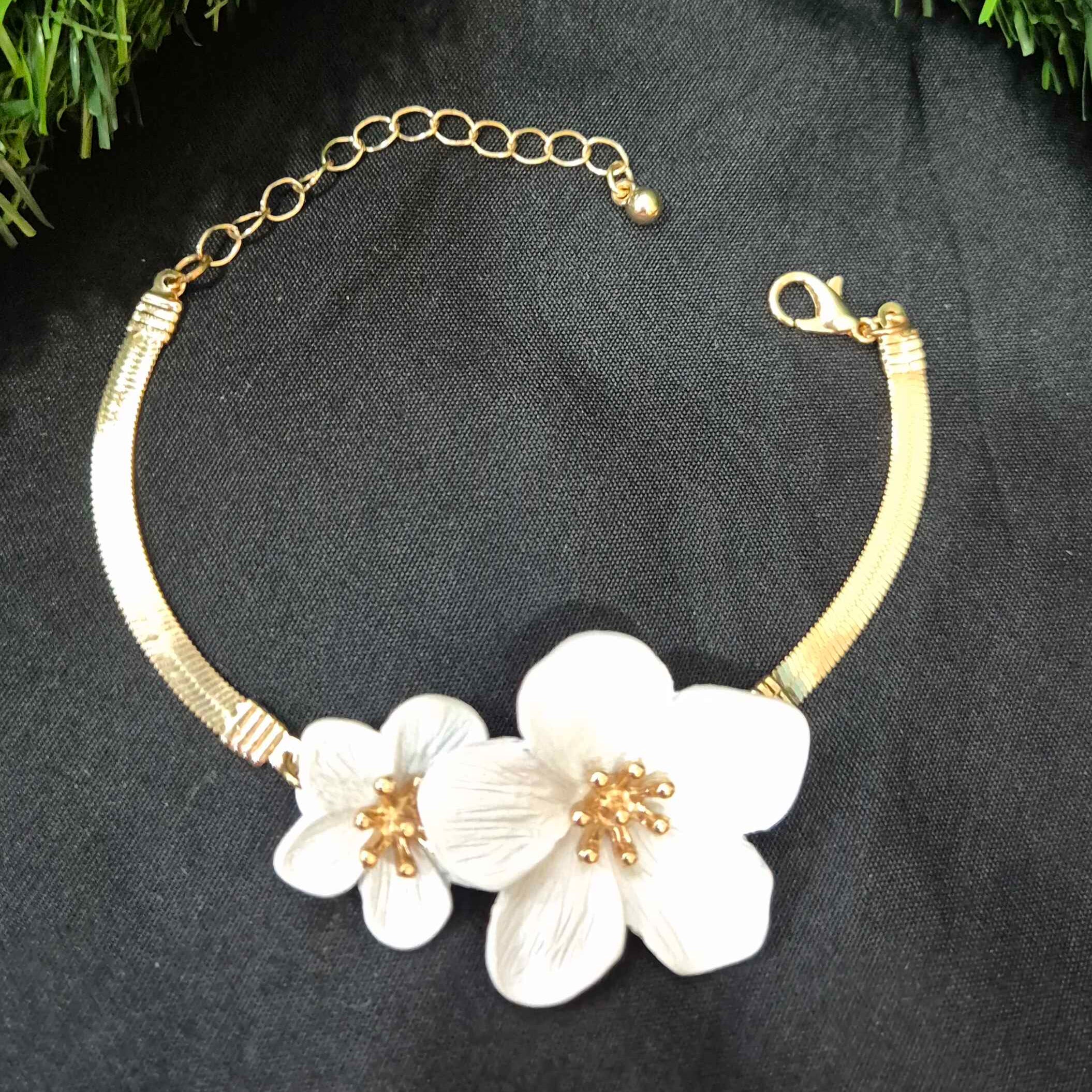 Gold-Tone Floral Bracelet with White Blossom Statement Design