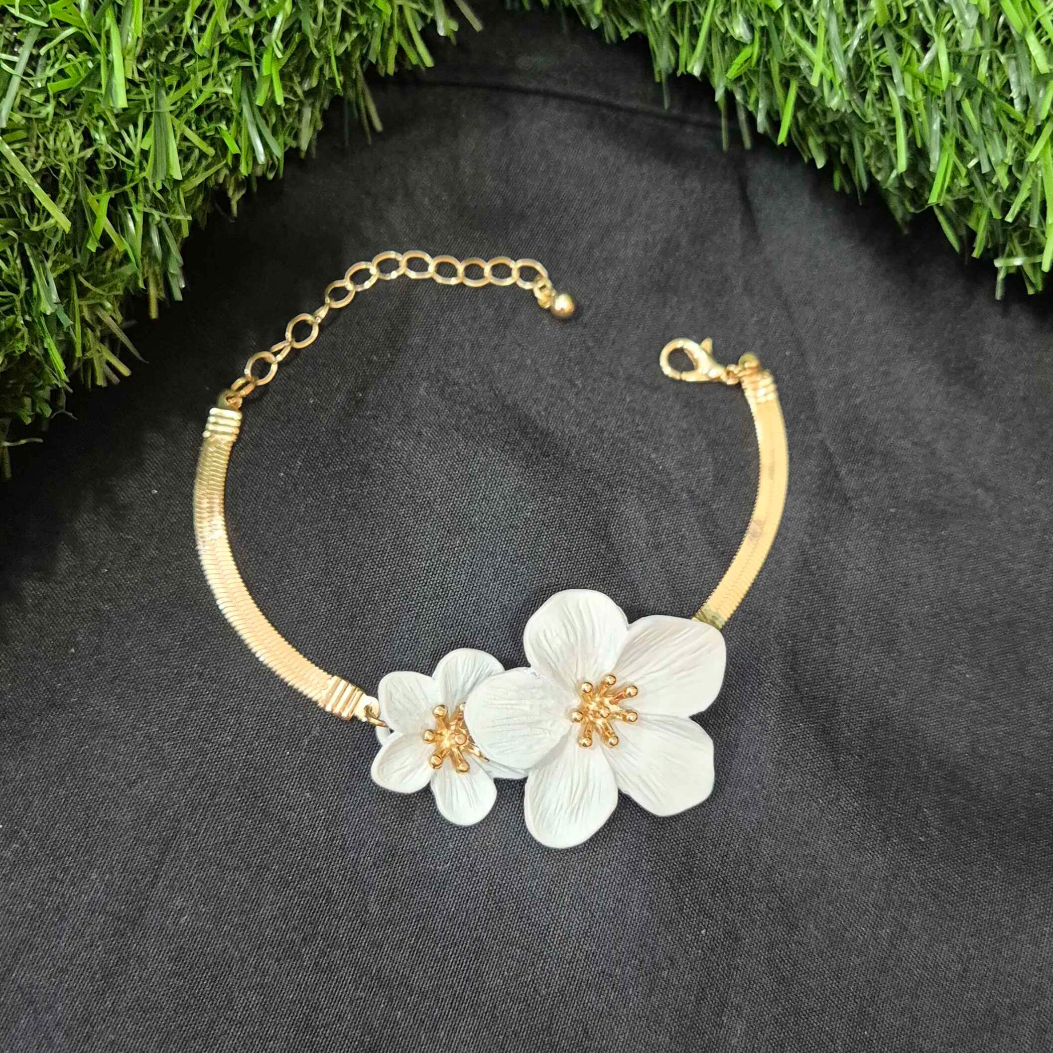 Gold-Tone Floral Bracelet with White Blossom Statement Design