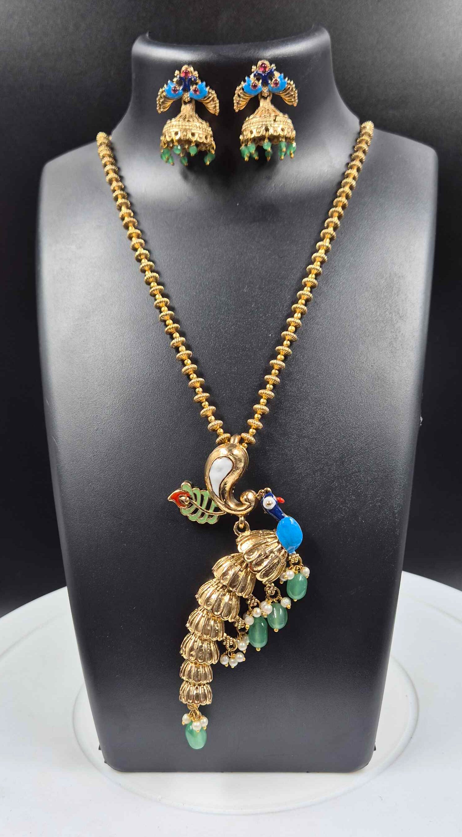 Peacock Design Pendant Necklace Set for Women | Antique Gold Plated Statement Jewelry with Jhumka Earrings