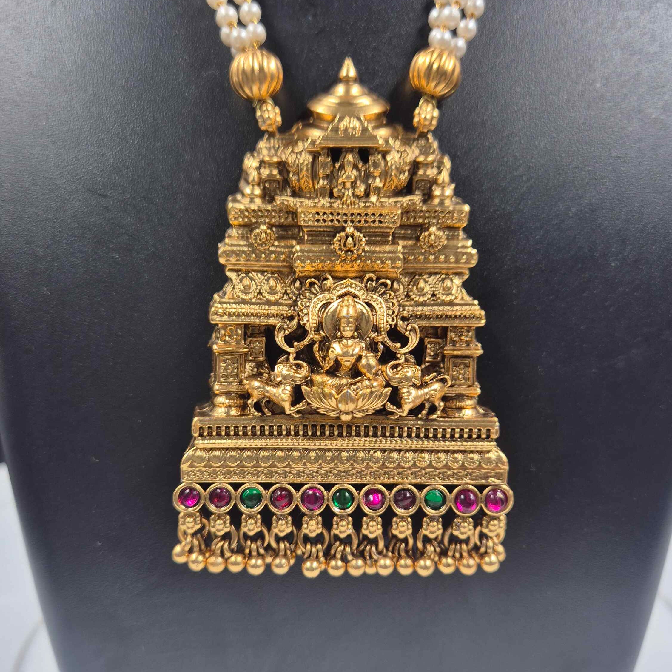 Grand Temple Gopuram Dollar Pearl Haram Necklace Set with Jhumka Earrings | Antique Gold Finish Bridal Jewelry