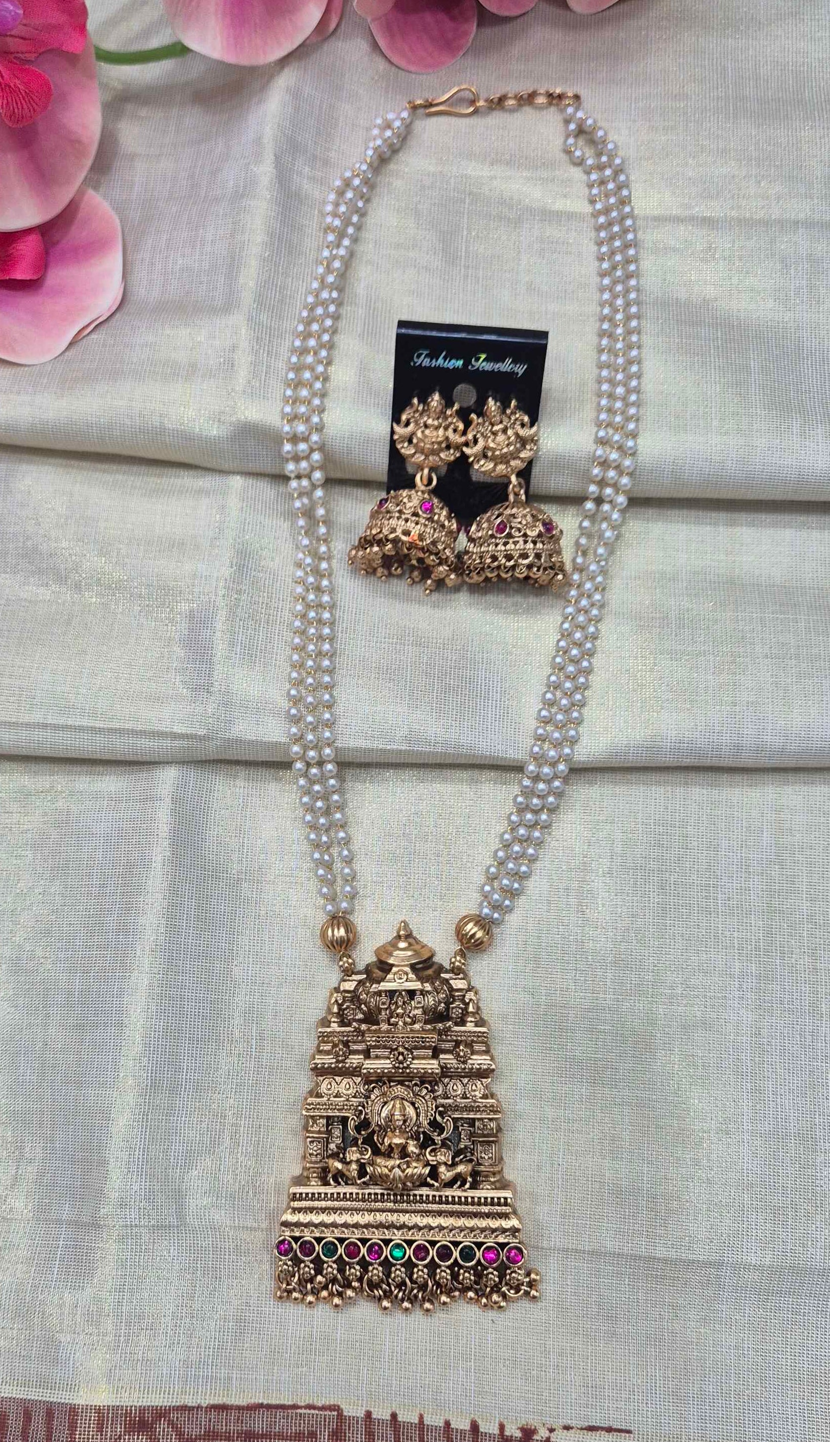 Grand Temple Gopuram Dollar Pearl Haram Necklace Set with Jhumka Earrings | Antique Gold Finish Bridal Jewelry