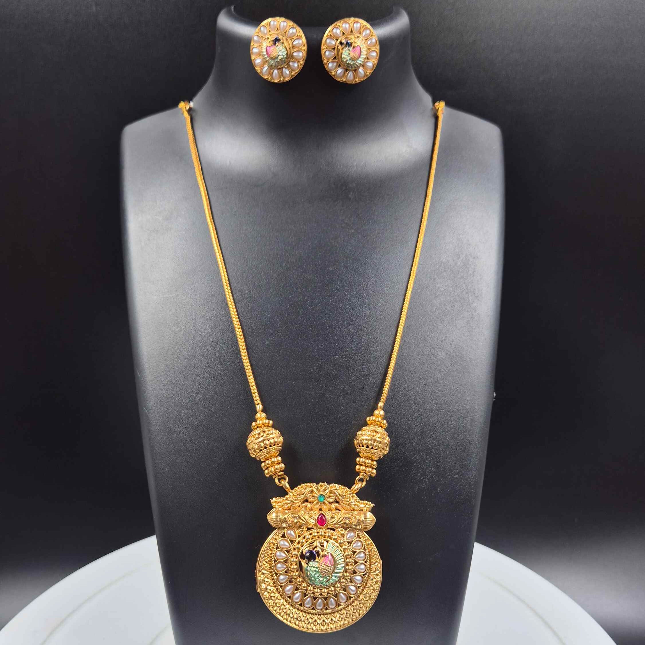 Double sided Kerala Peacock Pendant Necklace Set | Green on one side and white pearl on the otherr