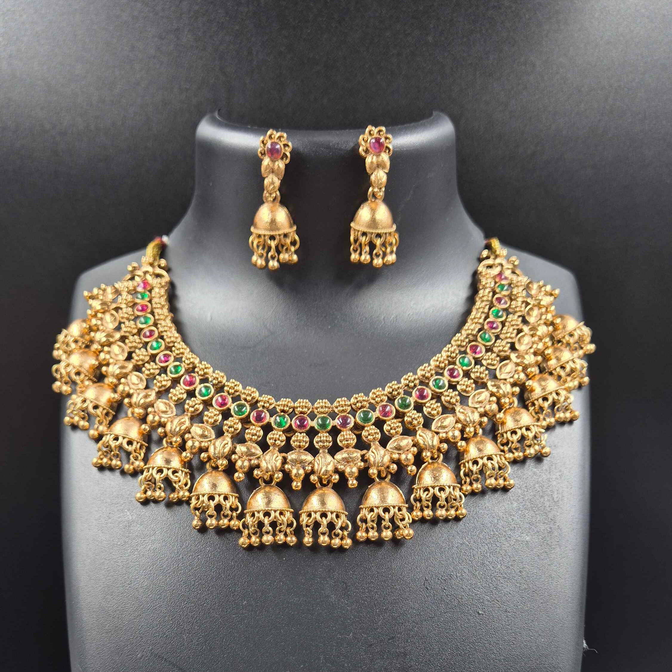 Antique Finish Jhumka Choker Necklace Set with Red & Green Stone Detailing