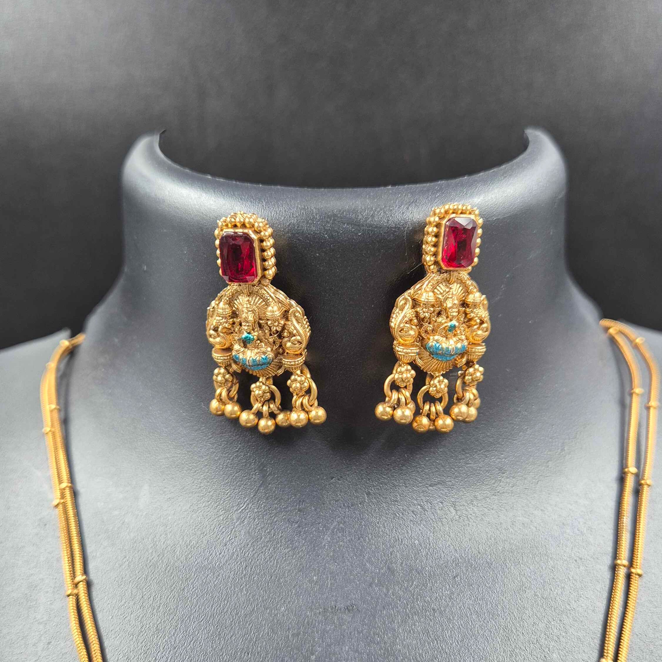 Double stranded Goddess Lakshmi Pendant Necklace Set with Ruby Red Stone and Antique Finish