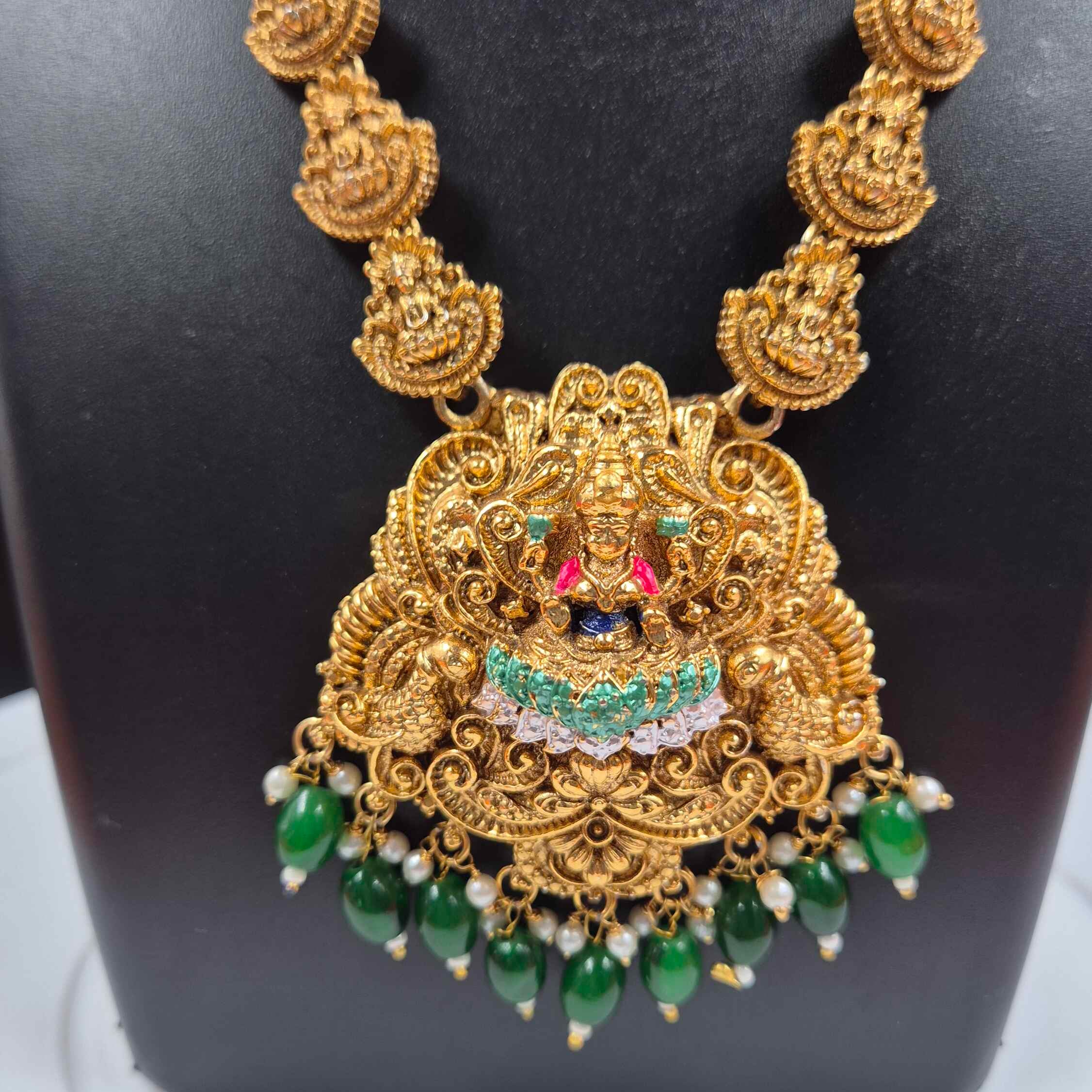 Emerald Temple Long Haram Set with Goddess Pendant & Green Bead Jhumkas