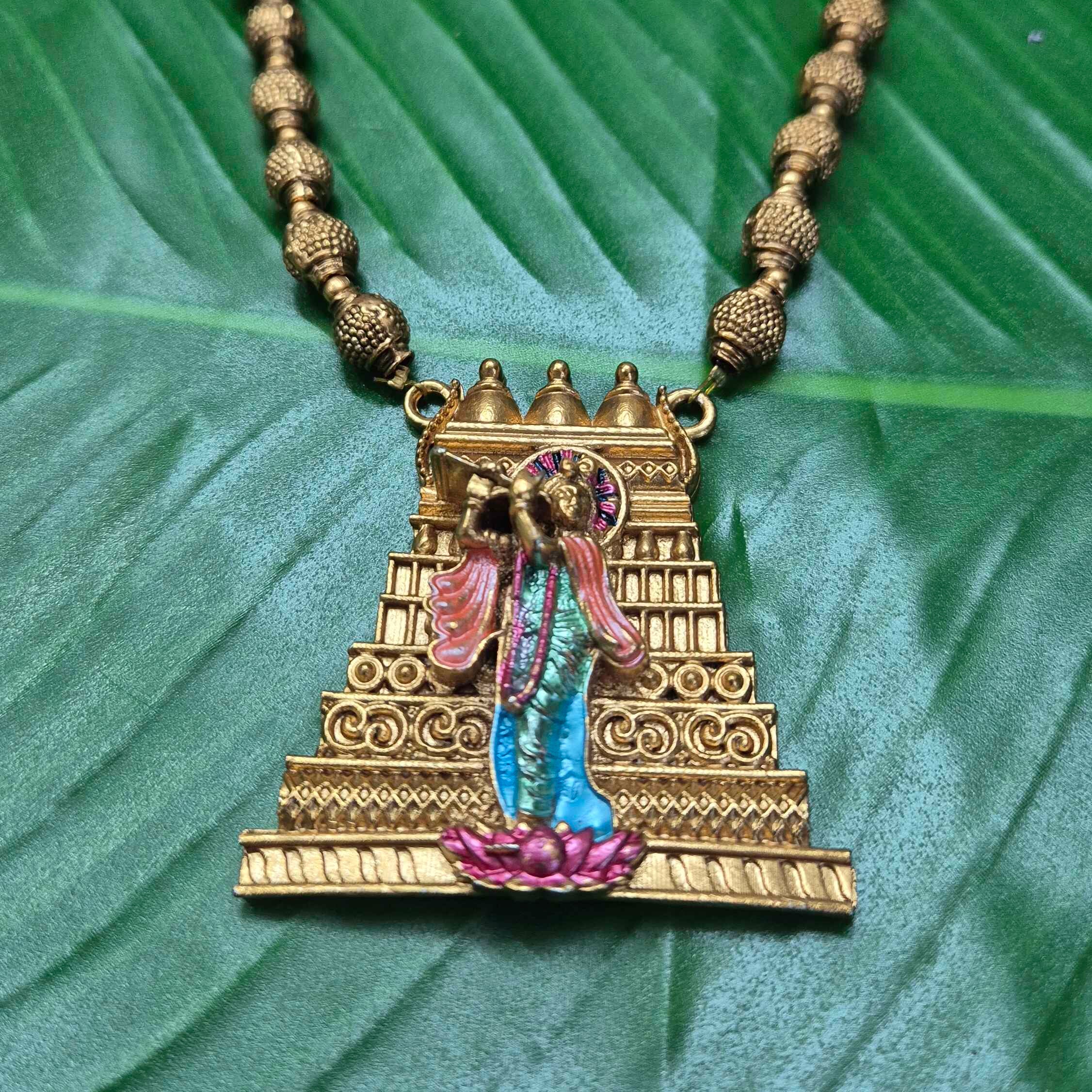 Long haram with Divine Krishna Deity Pendant & Matching Stud Earrings