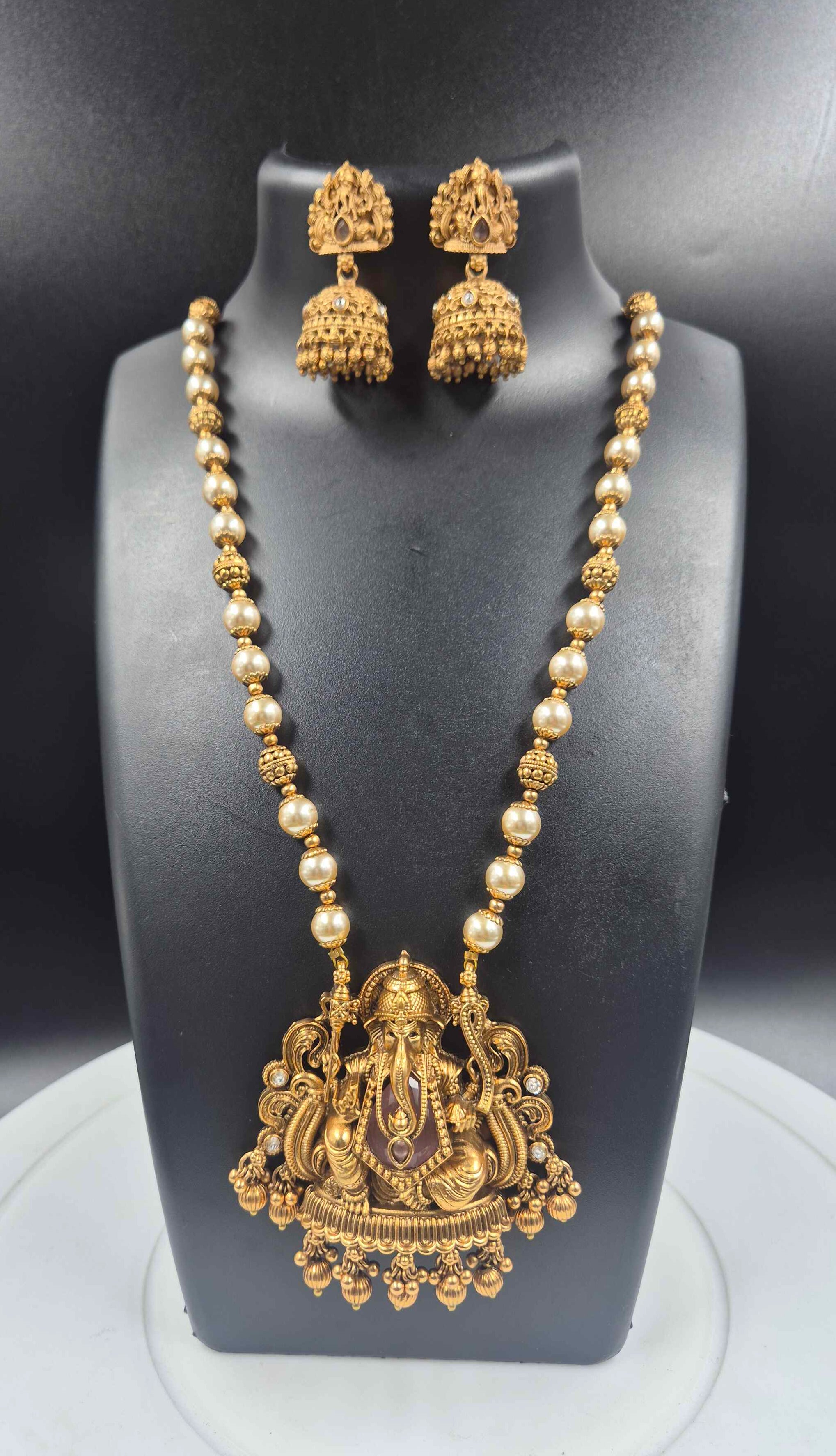 Antique Gold Ganesha Pearl Haram Necklace Set with Jhumkas