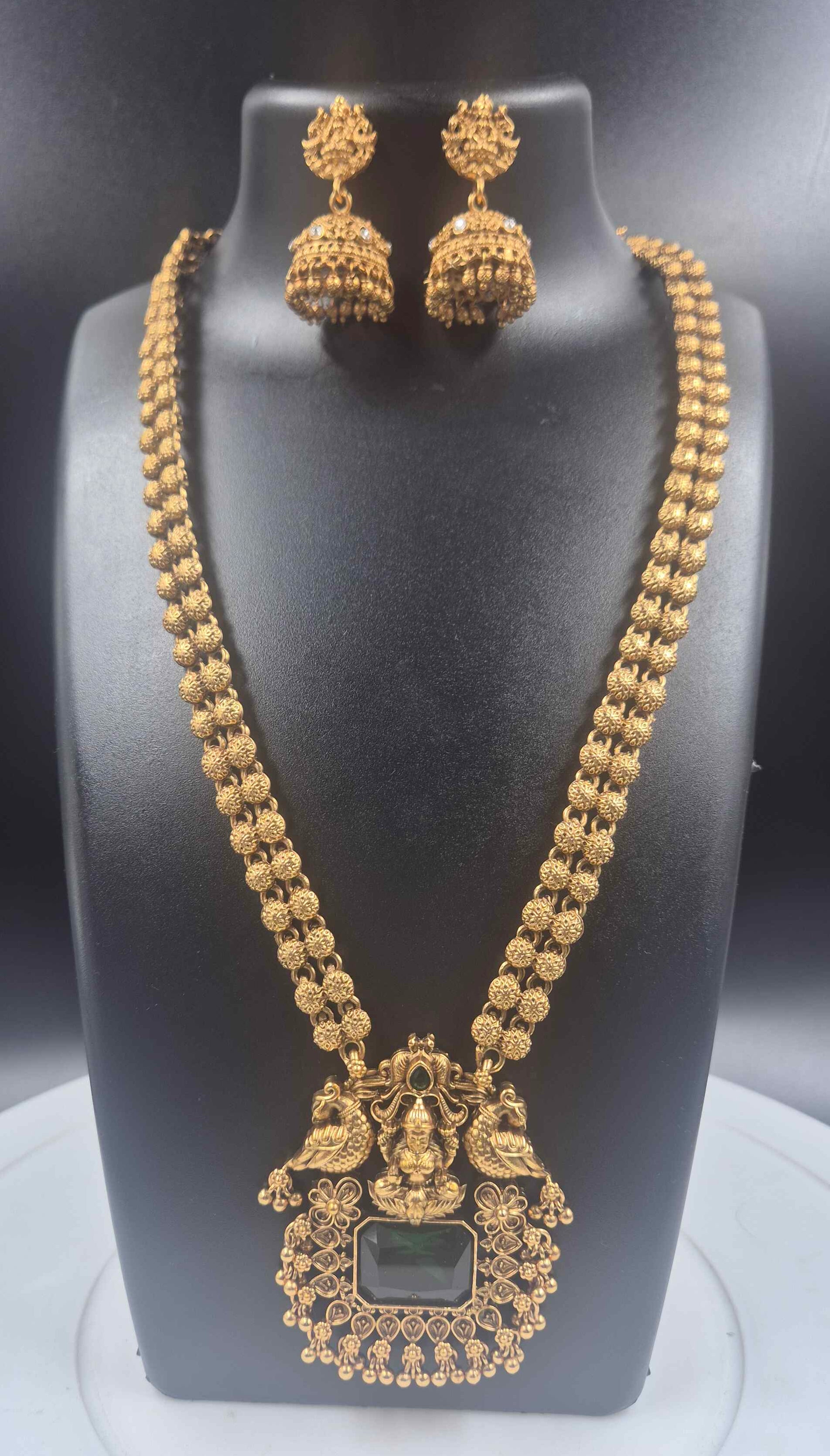 Temple Lakshmi Pendant Necklace Set with Green Stone & Jhumka Earrings | Antique Gold Finish
