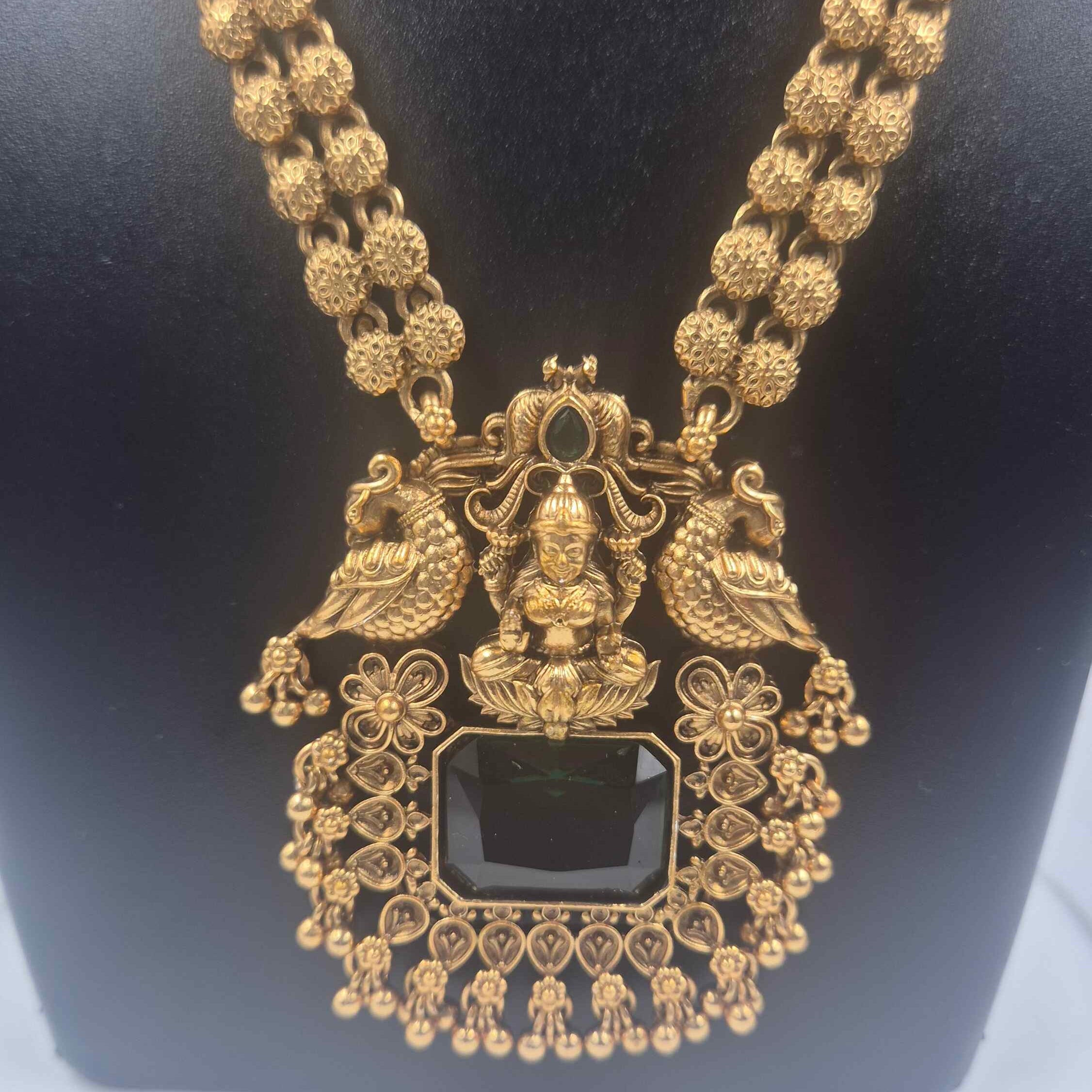 Temple Lakshmi Pendant Necklace Set with Green Stone & Jhumka Earrings | Antique Gold Finish