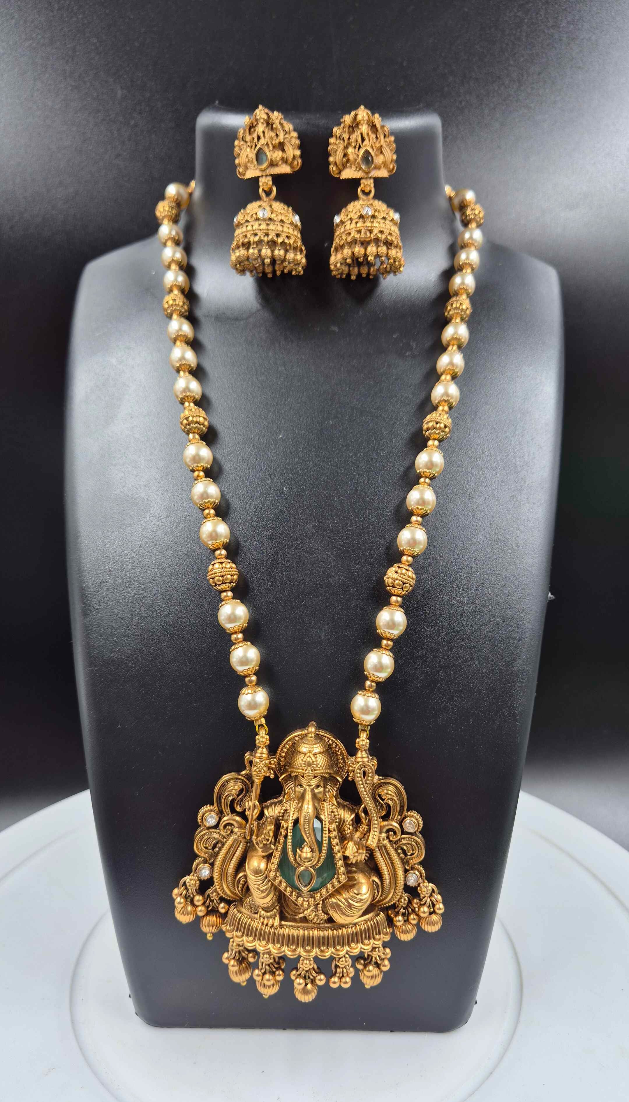 Lord Ganesha Pearl Long Haram with mint Green Stone | South Indian Temple Necklace Set with Jhumka Earrings