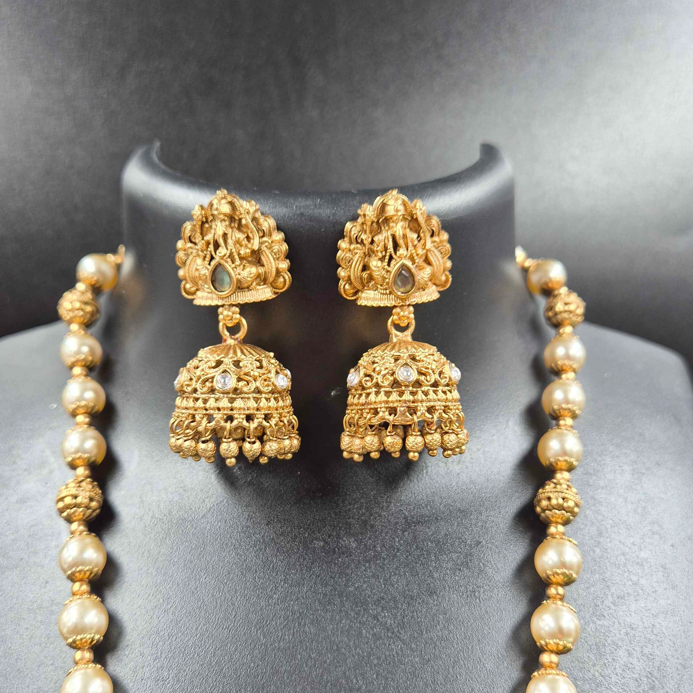Lord Ganesha Pearl Long Haram with mint Green Stone | South Indian Temple Necklace Set with Jhumka Earrings