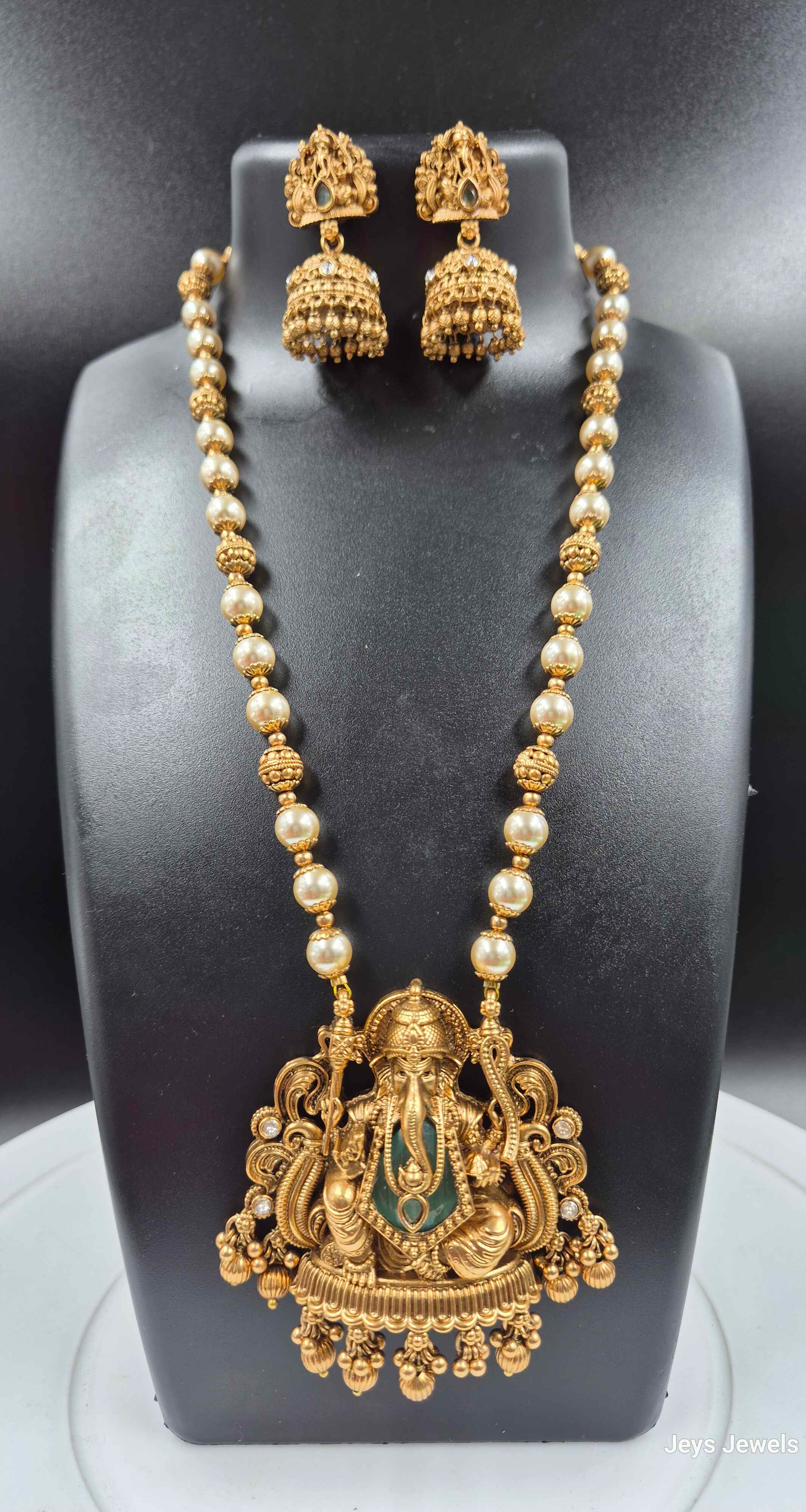 Lord Ganesha Pearl Long Haram with mint Green Stone | South Indian Temple Necklace Set with Jhumka Earrings