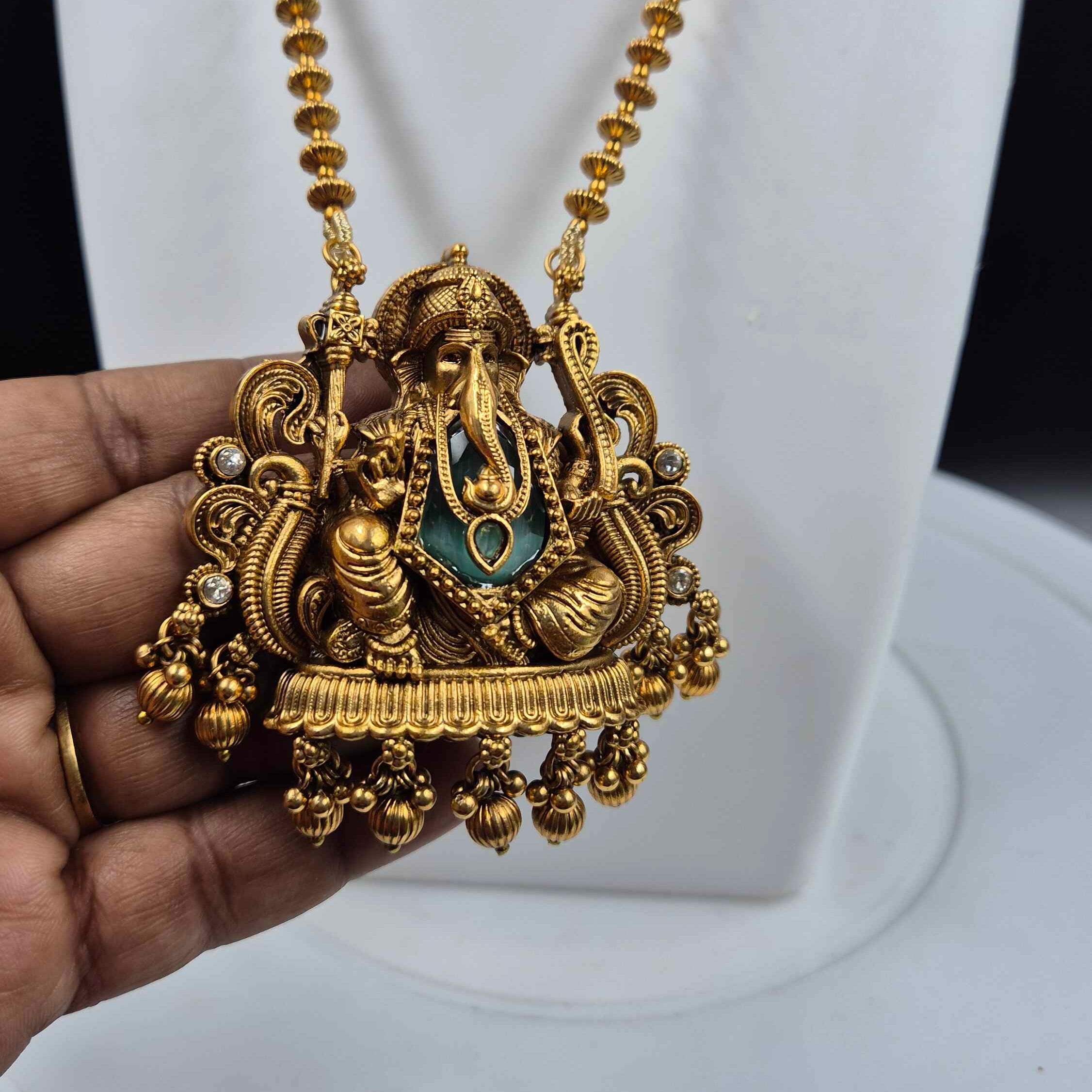 Gold Ganesha Temple Pendant Necklace Set with Jhumka Earrings | Traditional South Indian Jewelry