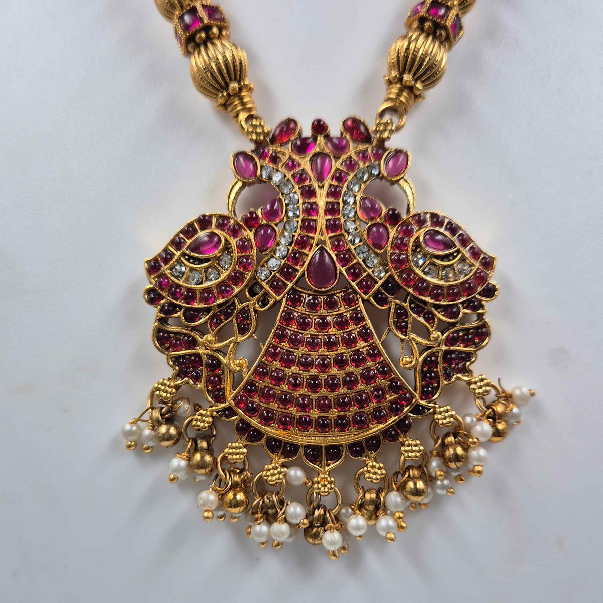 Traditional Ruby Tone garuda pendant with Pearl Jhumkas