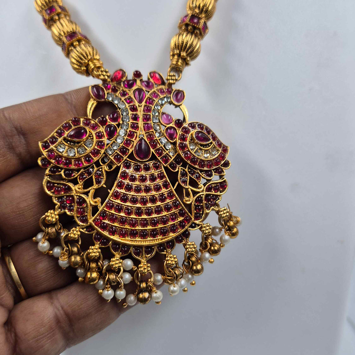 Traditional Ruby Tone garuda pendant with Pearl Jhumkas