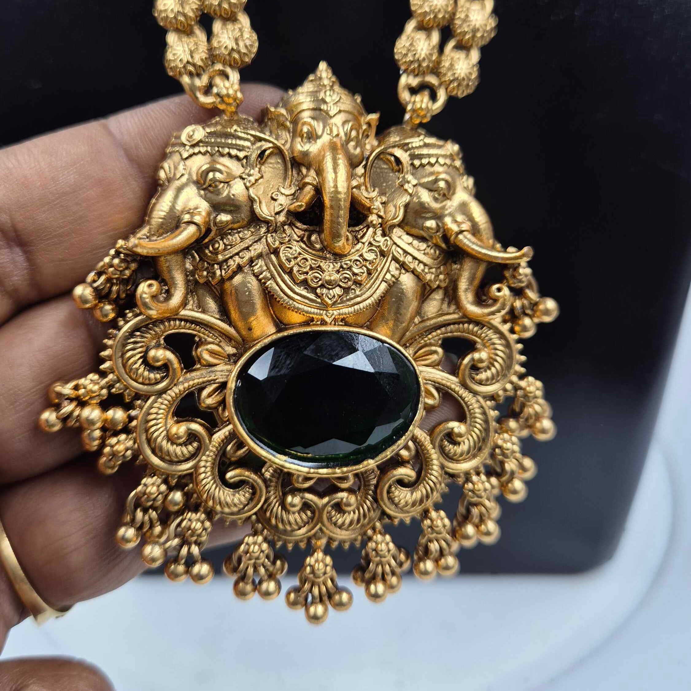 Antique Gold Ganesha Haram  with green stone with Jhumka Earrings