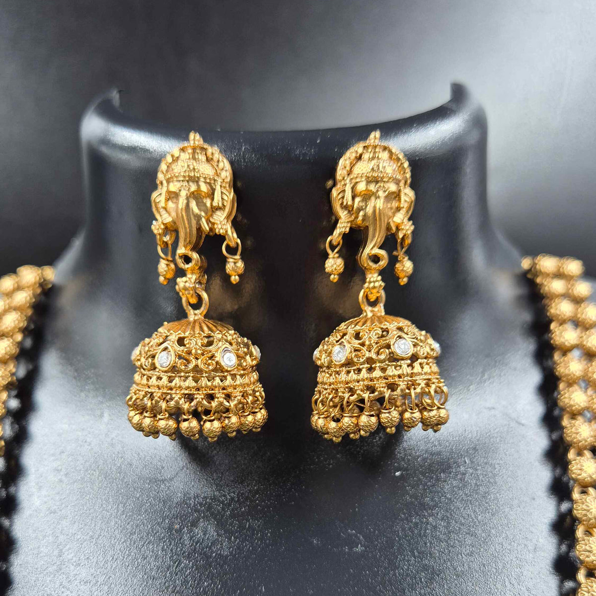 Antique Gold Ganesha Haram Necklace Set with  red stone and Jhumka Earrings