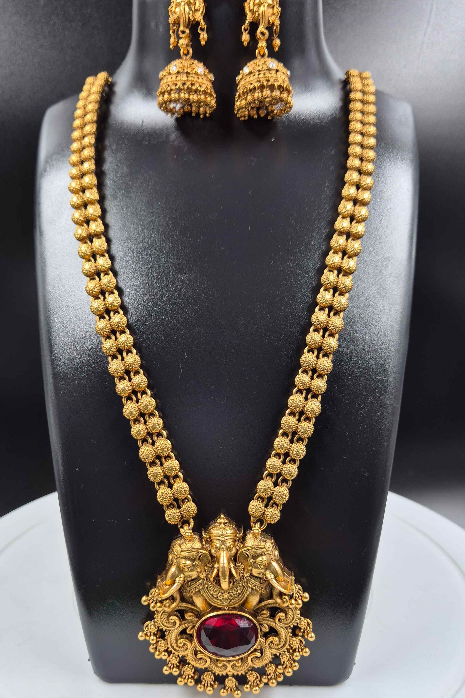 Antique Gold Ganesha Haram Necklace Set with  red stone and Jhumka Earrings
