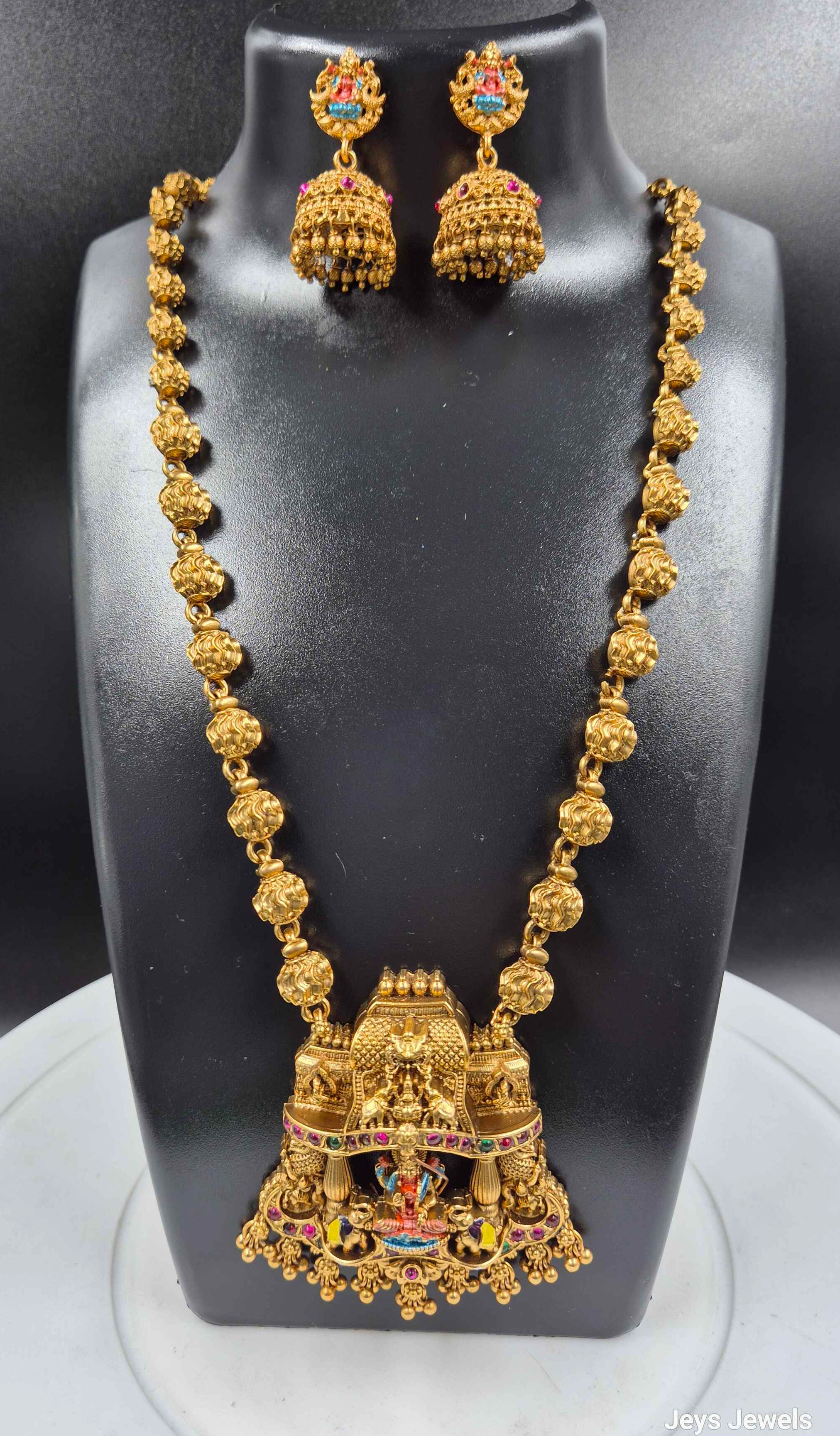 Antique Gold Lakshmi Pendant Necklace Set with Jhumkas